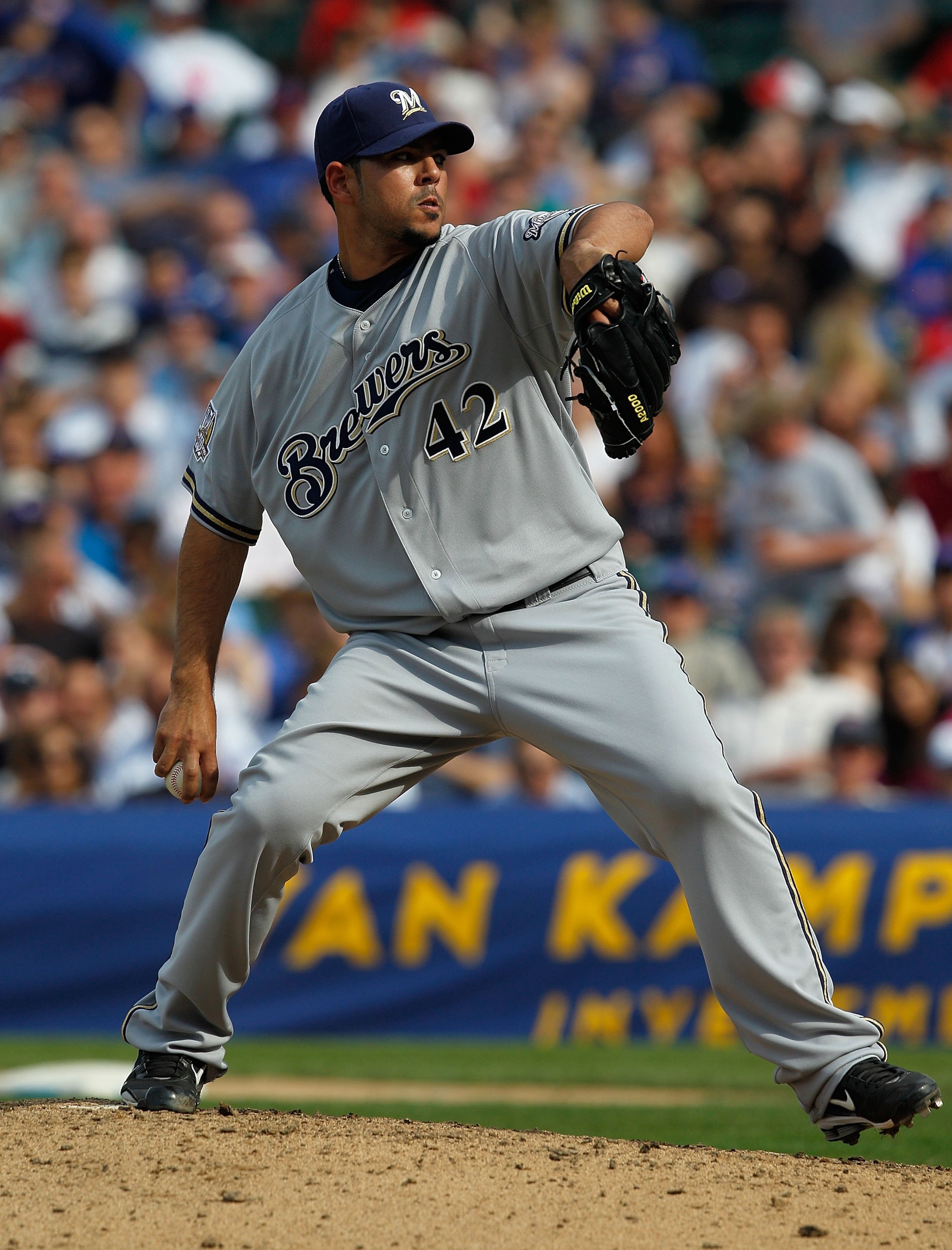 CHICAGO - APRIL 15: Carlos Villanueva of the Milwaukee Brewers, wearing a number 42 jersey in honor of Jackie Robinson, delivers the ball against the Chicago Cubs at Wrigley Field on April 15, 2010 in Chicago, Illinois. The Brewers defeated the Cubs 8-6. 