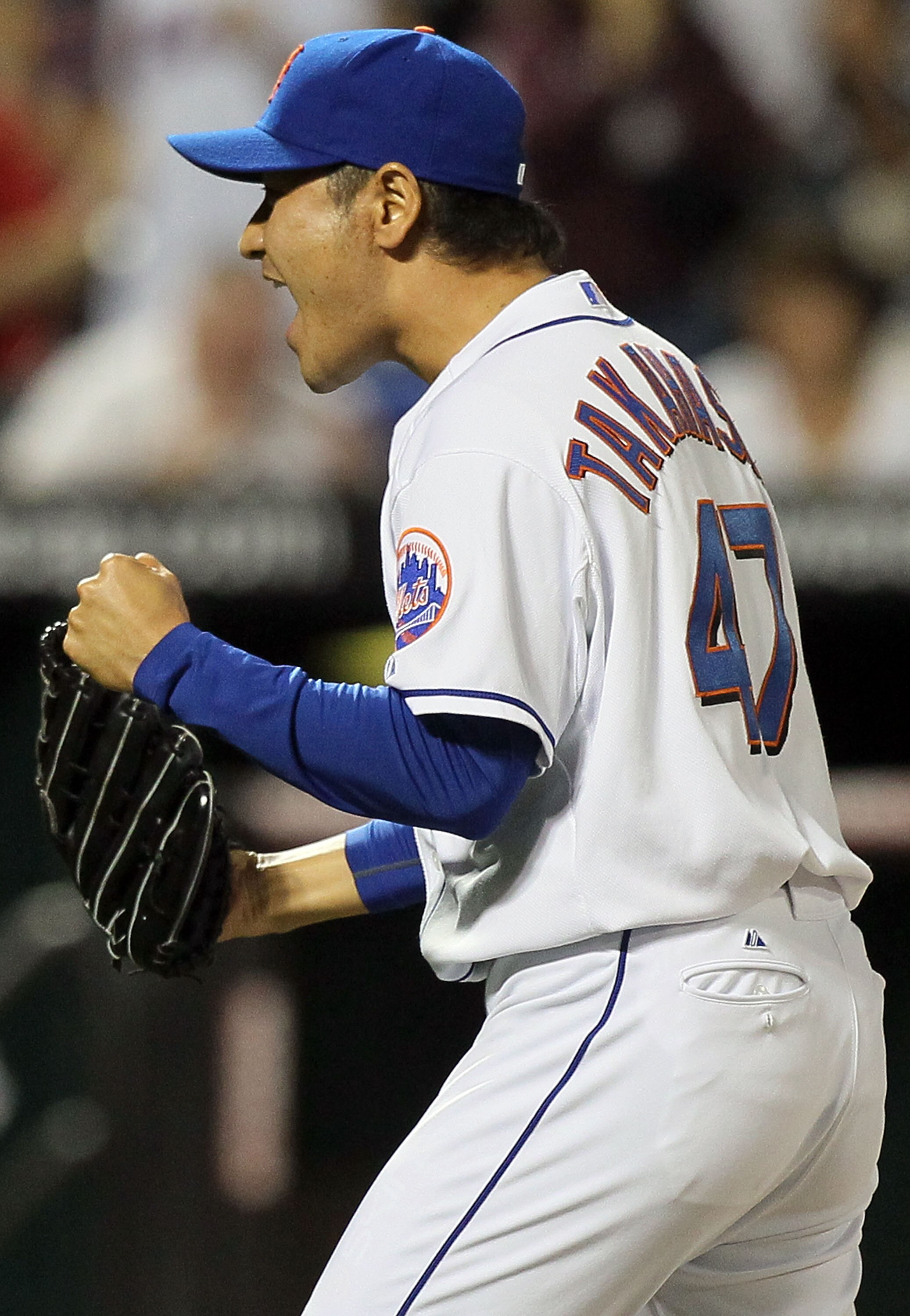 NEW YORK - AUGUST 27:  Hisanori Takahashi #47 of the New York Mets celebrates after defeating the Houston Astros on August 27, 2010 at Citi Field in the Flushing neighborhood of the Queens borough of New York City. The Mets defeated the Astros 2-1.  (Phot