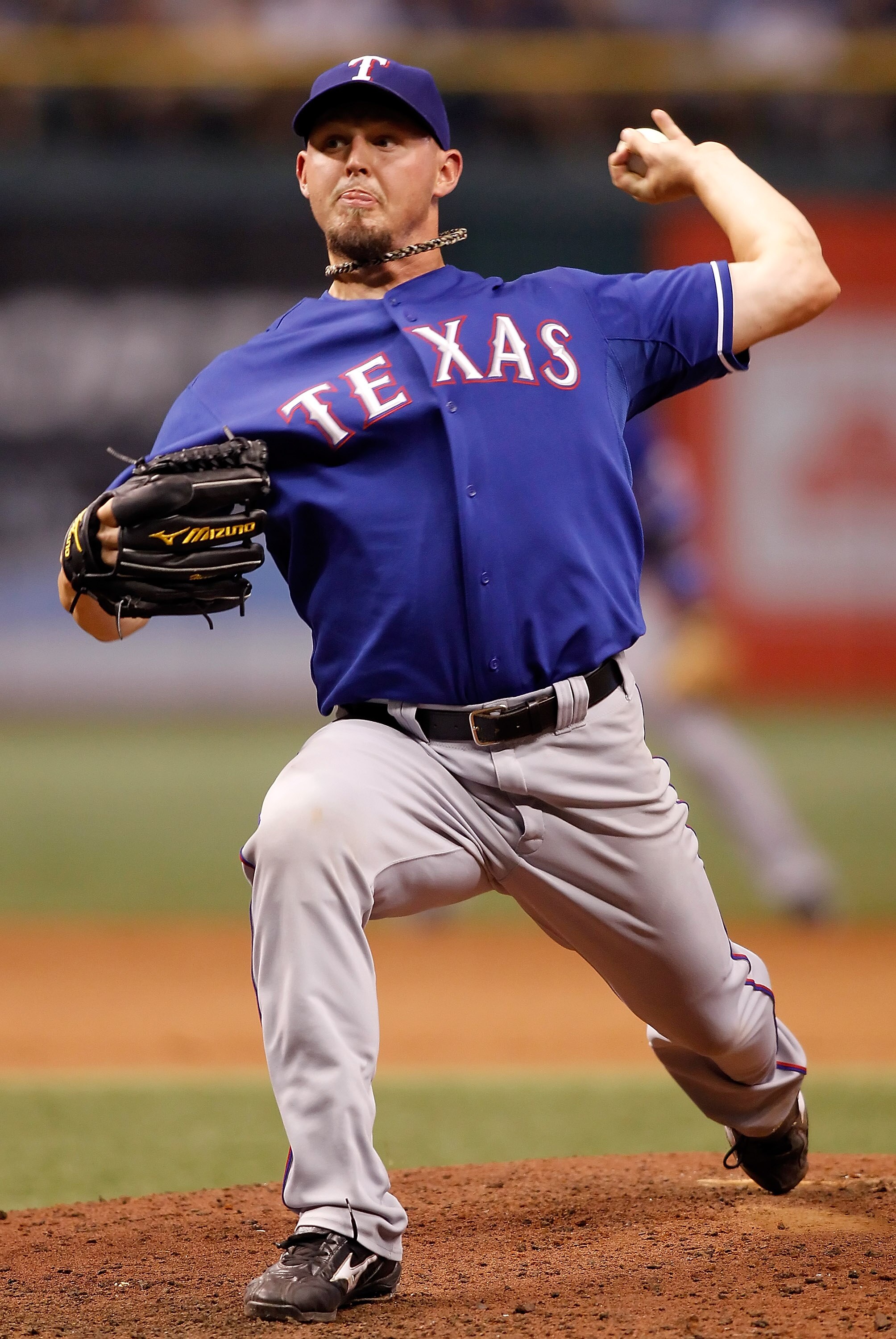 ST. PETERSBURG - AUGUST 17:  Pitcher Matt Harrison #54 of the Texas Rangers pitches against the Tampa Bay Rays during the game at Tropicana Field on August 17, 2010 in St. Petersburg, Florida.  (Photo by J. Meric/Getty Images)
