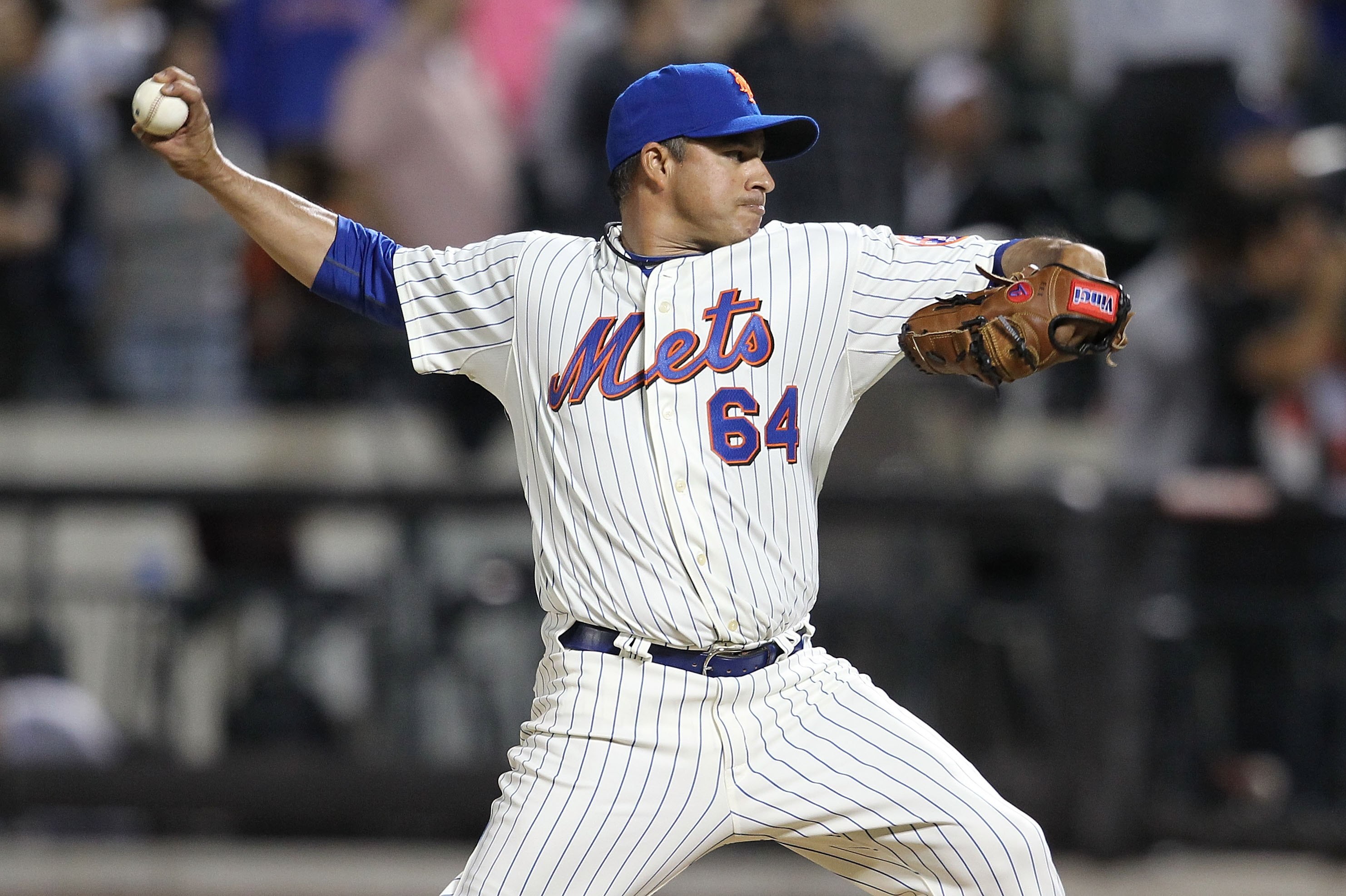 NEW YORK - JUNE 08:  Elmer Dessens #64 of the New York Mets pitches against the San Diego Padres on June 8, 2010 in the Flushing neighborhood of the Queens borough of New York City.  (Photo by Nick Laham/Getty Images)