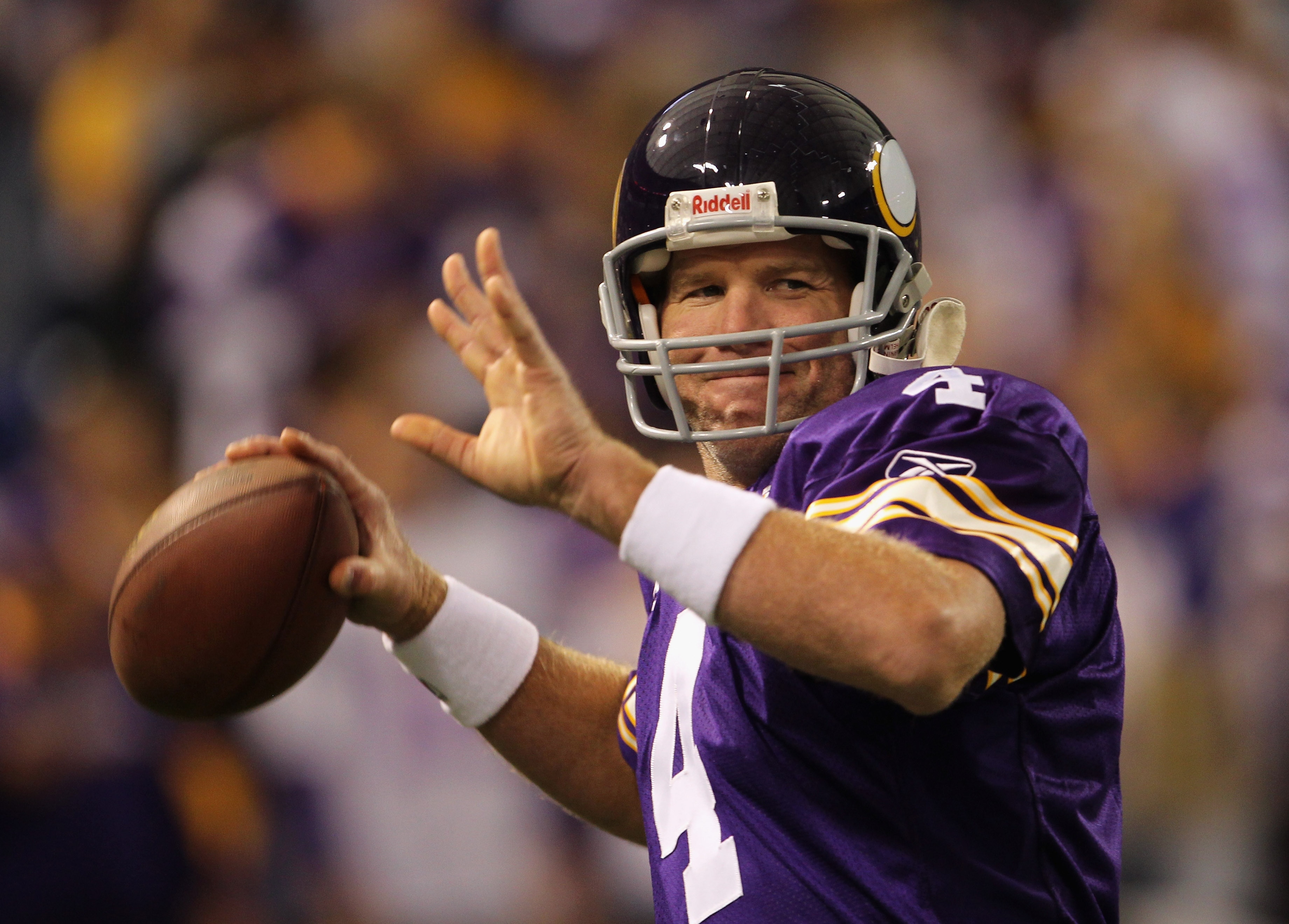 MINNEAPOLIS - SEPTEMBER 19:  Quarterback Brett Favre #4 of the Minnesota Vikings warms up prior to the start of the game against the Miami Dolphins on September 19, 2010 at Hubert H. Humphrey Metrodome in Minneapolis, Minnesota.  (Photo by Jamie Squire/Ge