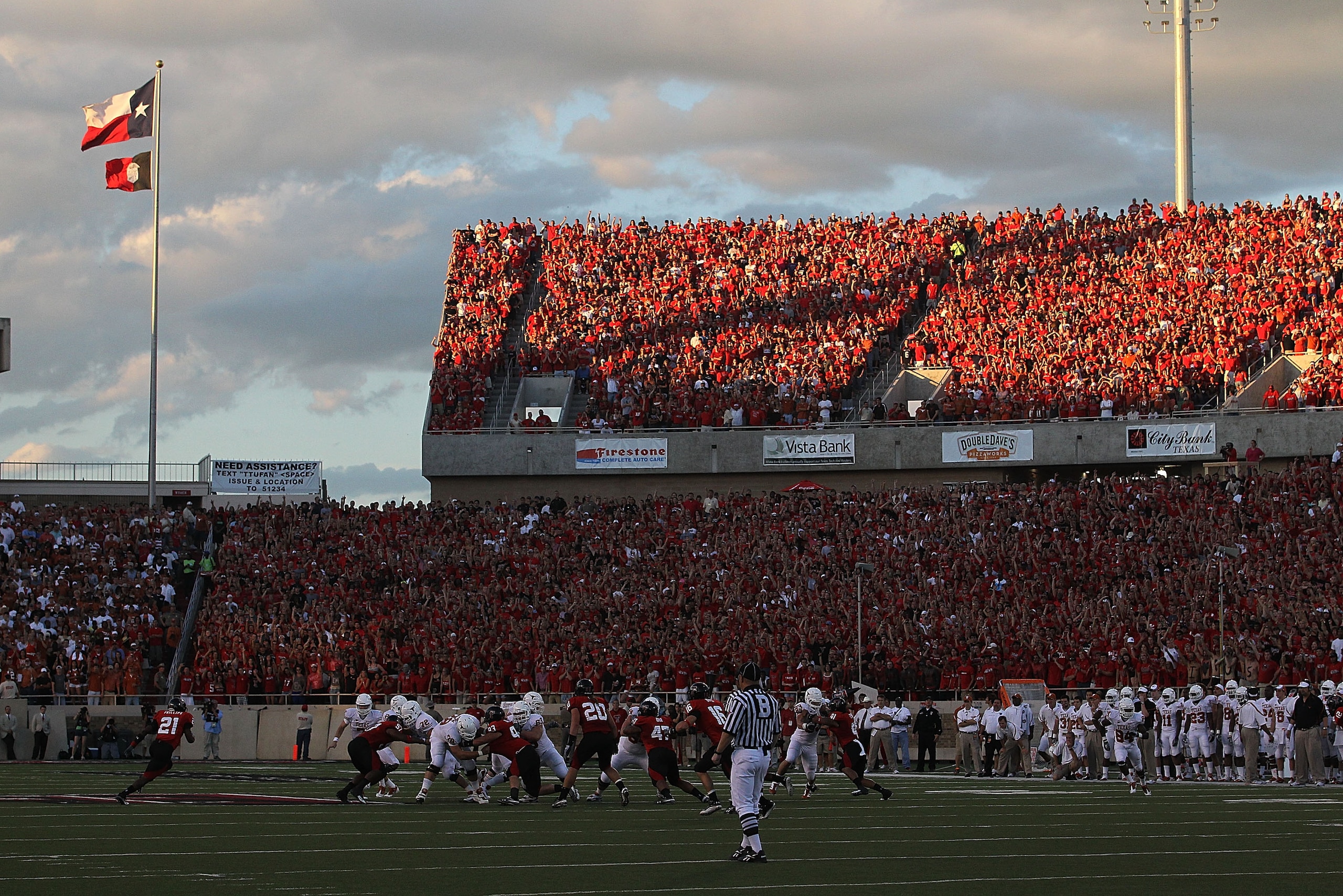 LUBBOCK, TX - SEPTEMBER 18:  The Texas Longhorns on offense against the Texas Tech Red Raiders at Jones AT&T Stadium on September 18, 2010 in Lubbock, Texas.  (Photo by Ronald Martinez/Getty Images)