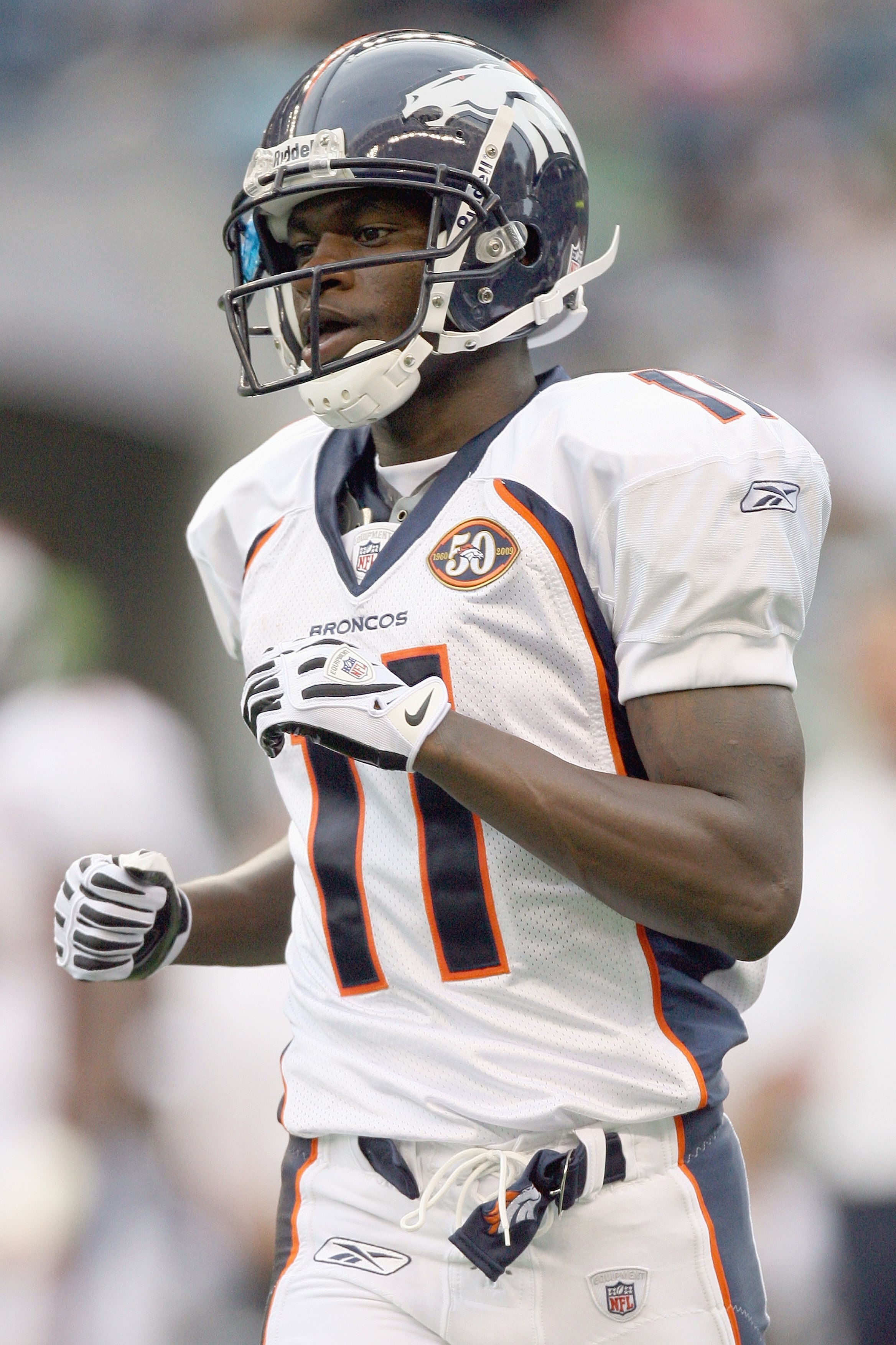 SEATTLE - AUGUST 22:  Kenny McKinley #11 of the Denver Broncos jogs on the field during the game against the Seattle Seahawks on August 22, 2009 at Qwest Field in Seattle, Washington. (Photo by Otto Greule Jr/Getty Images)