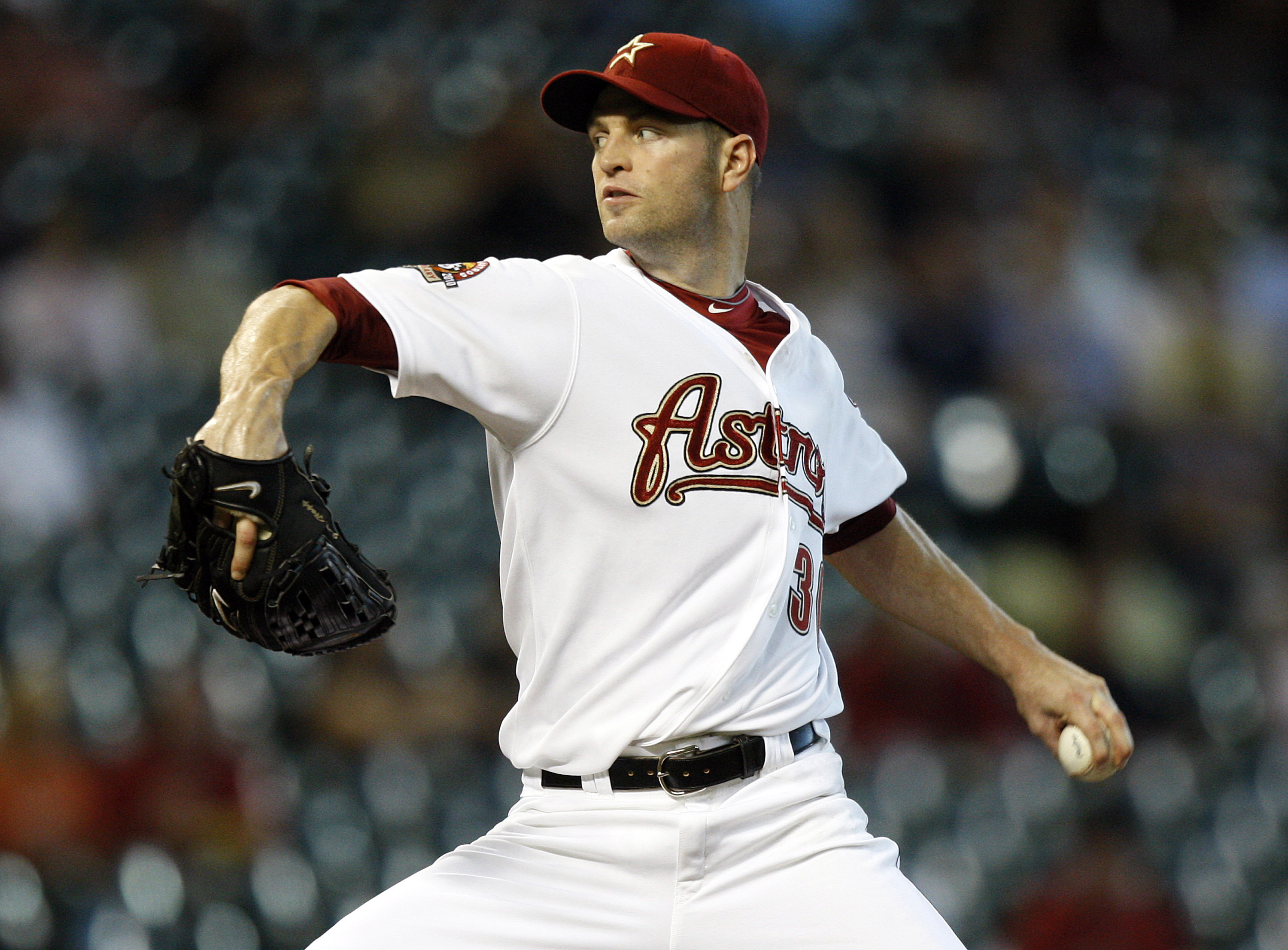 HOUSTON - SEPTEMBER 15:  Pitcher J.A. Happ #30 of the Houston Astros throws against the Milwaukee Brewers in the first inning at Minute Maid Park on September 15, 2010 in Houston, Texas.  (Photo by Bob Levey/Getty Images)
