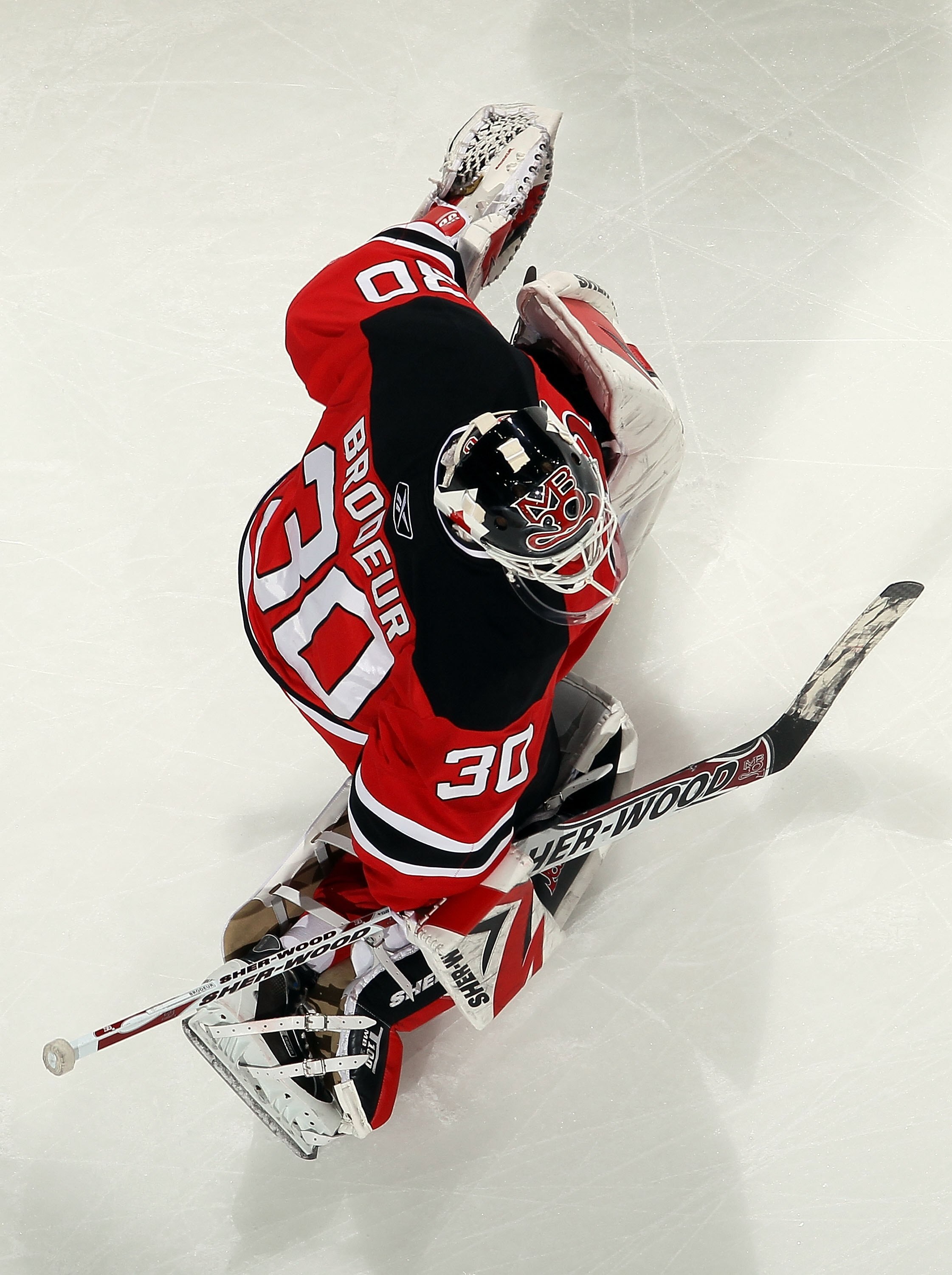 NEWARK, NJ - APRIL 10:  Martin Brodeur #30 of the New Jersey Devils warms up before playing against the New York Islanders at the Prudential Center on April 10, 2010 in Newark, New Jersey.  (Photo by Jim McIsaac/Getty Images)