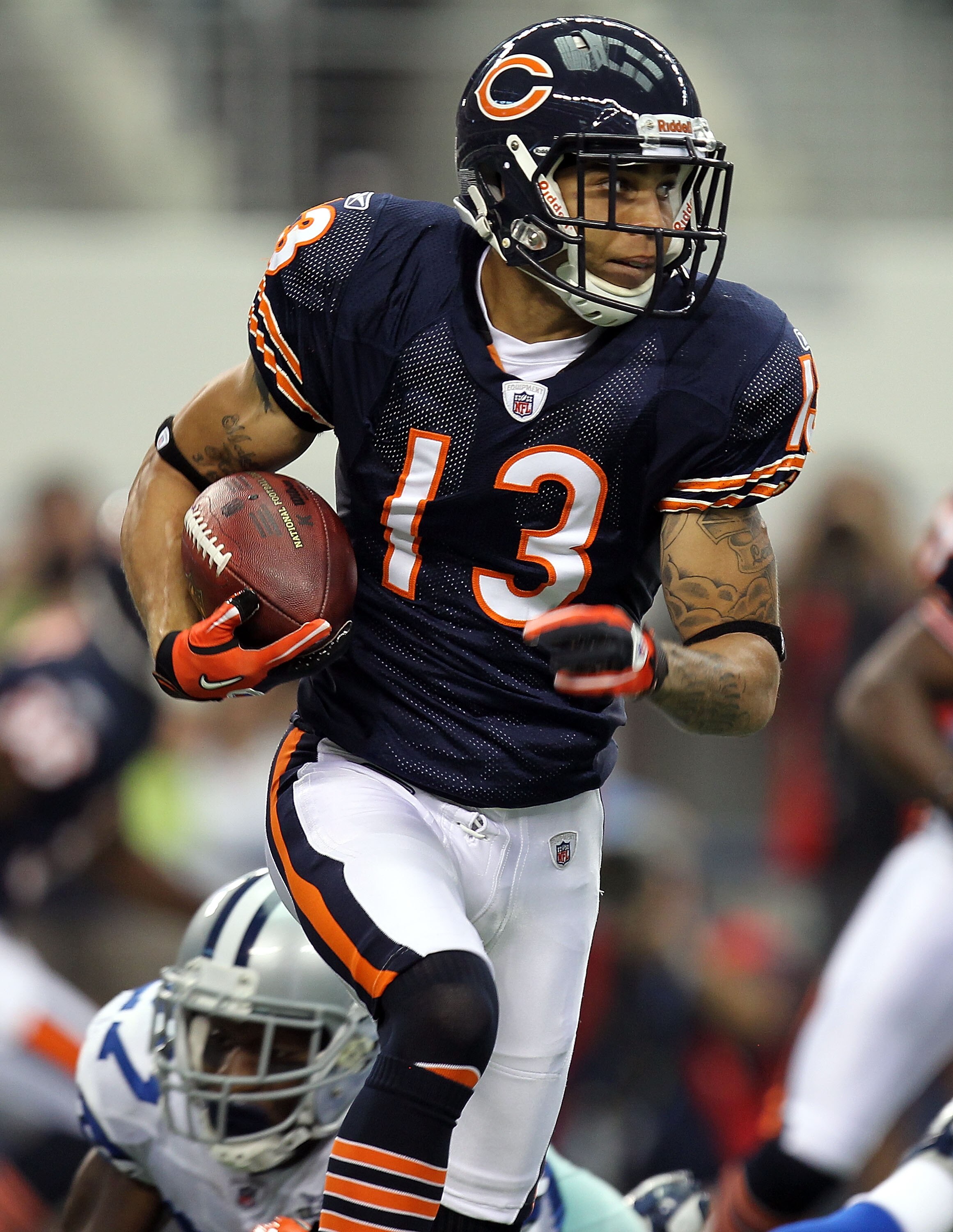 ARLINGTON, TX - SEPTEMBER 19:  Wide receiver Johnny Knox #13 of the Chicago Bears runs the ball against the Dallas Cowboys at Cowboys Stadium on September 19, 2010 in Arlington, Texas.  (Photo by Ronald Martinez/Getty Images)