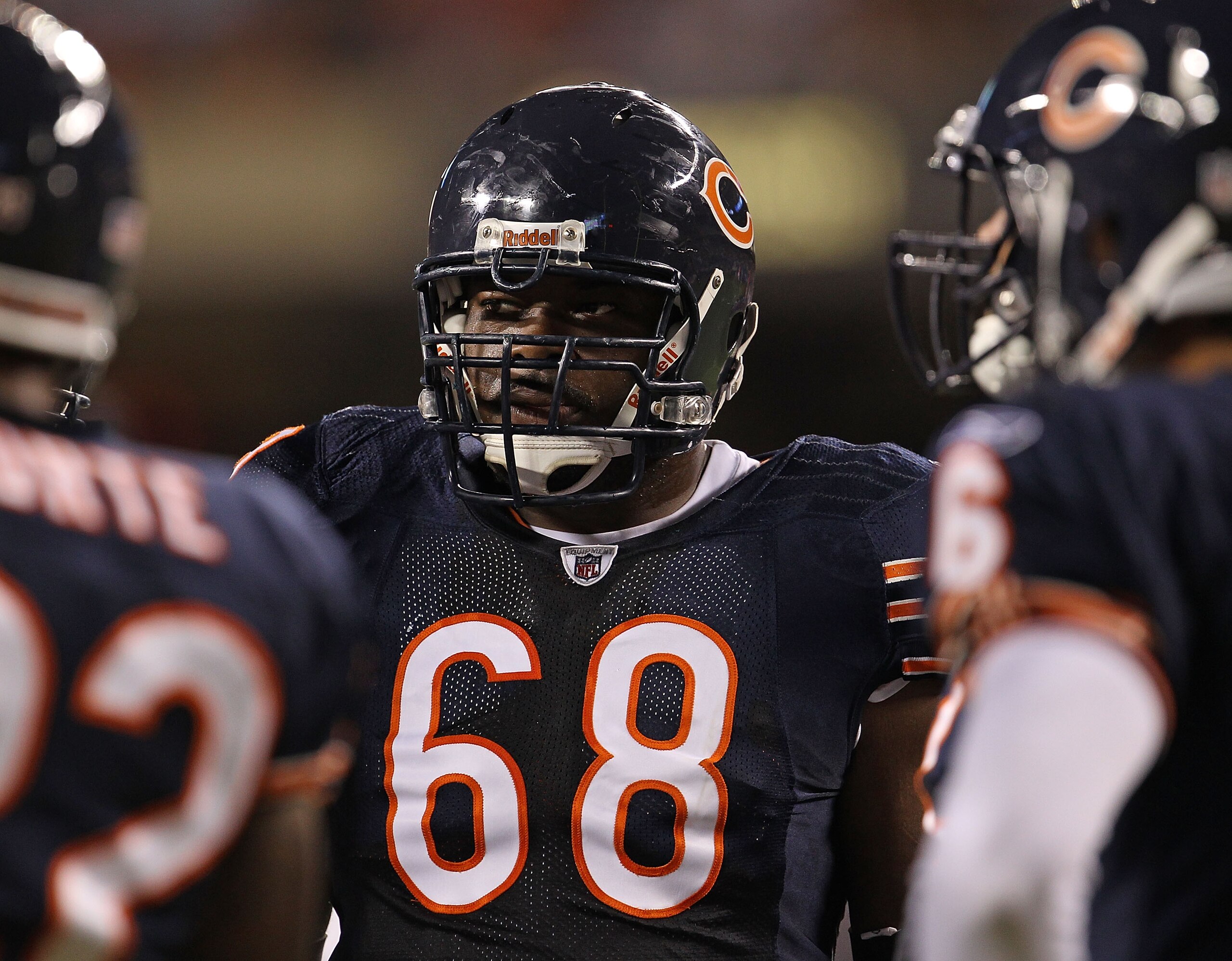 CHICAGO - AUGUST 28: Frank Omiyale #68 of the Chicago Bears waits in the huddle during a preseason game against the Arizona Cardinals at Soldier Field on August 28, 2010 in Chicago, Illinois. The Cardinals defeated the Bears 14-9. (Photo by Jonathan Danie