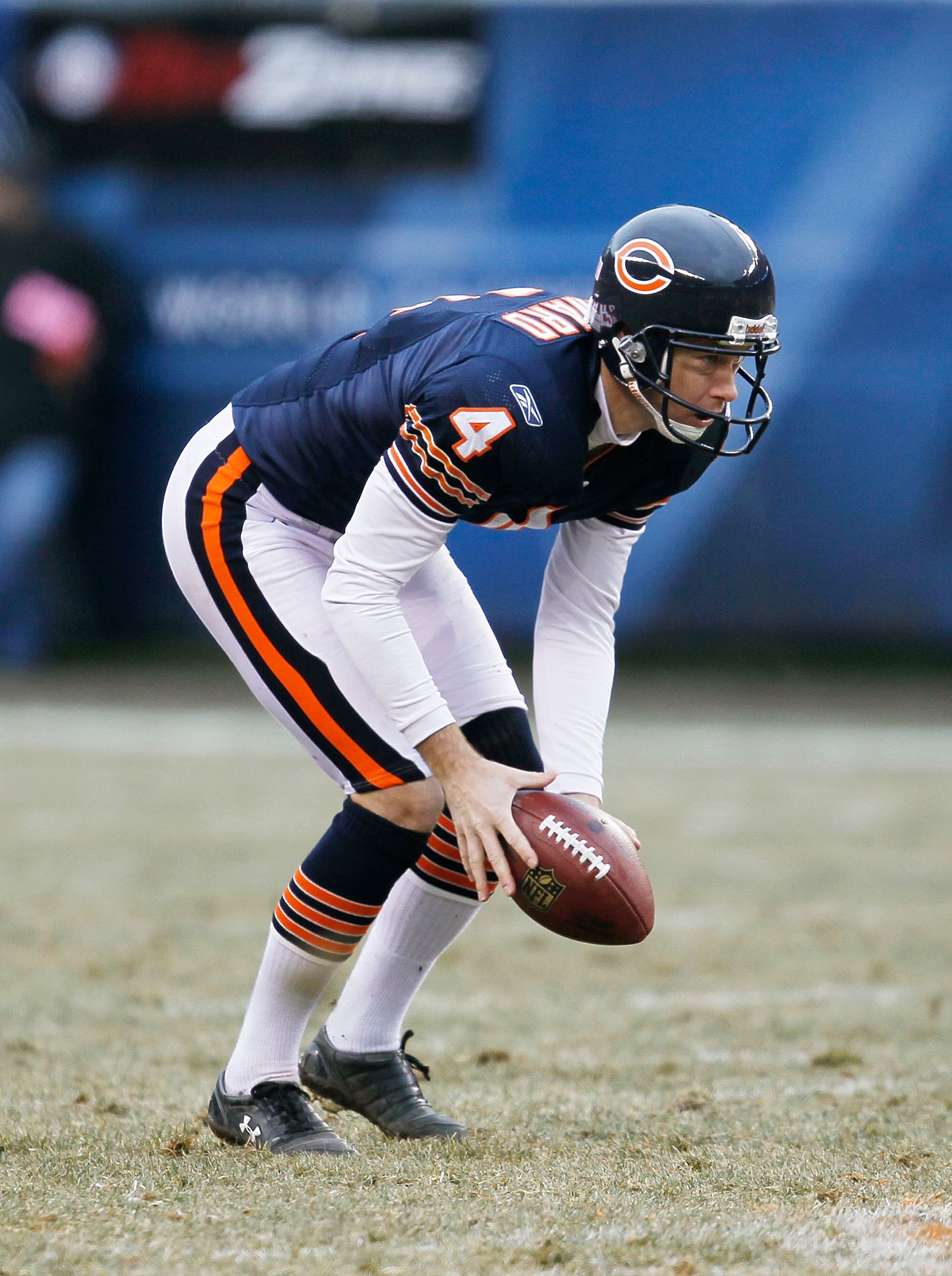 CHICAGO - DECEMBER 13: Brad Maynard #4 of the Chicago Bears catches a low snap before punting against the Green Bay Packers at Soldier Field on December 13, 2009 in Chicago, Illinois. The Packers defeated the Bears 21-14. (Photo by Jonathan Daniel/Getty I
