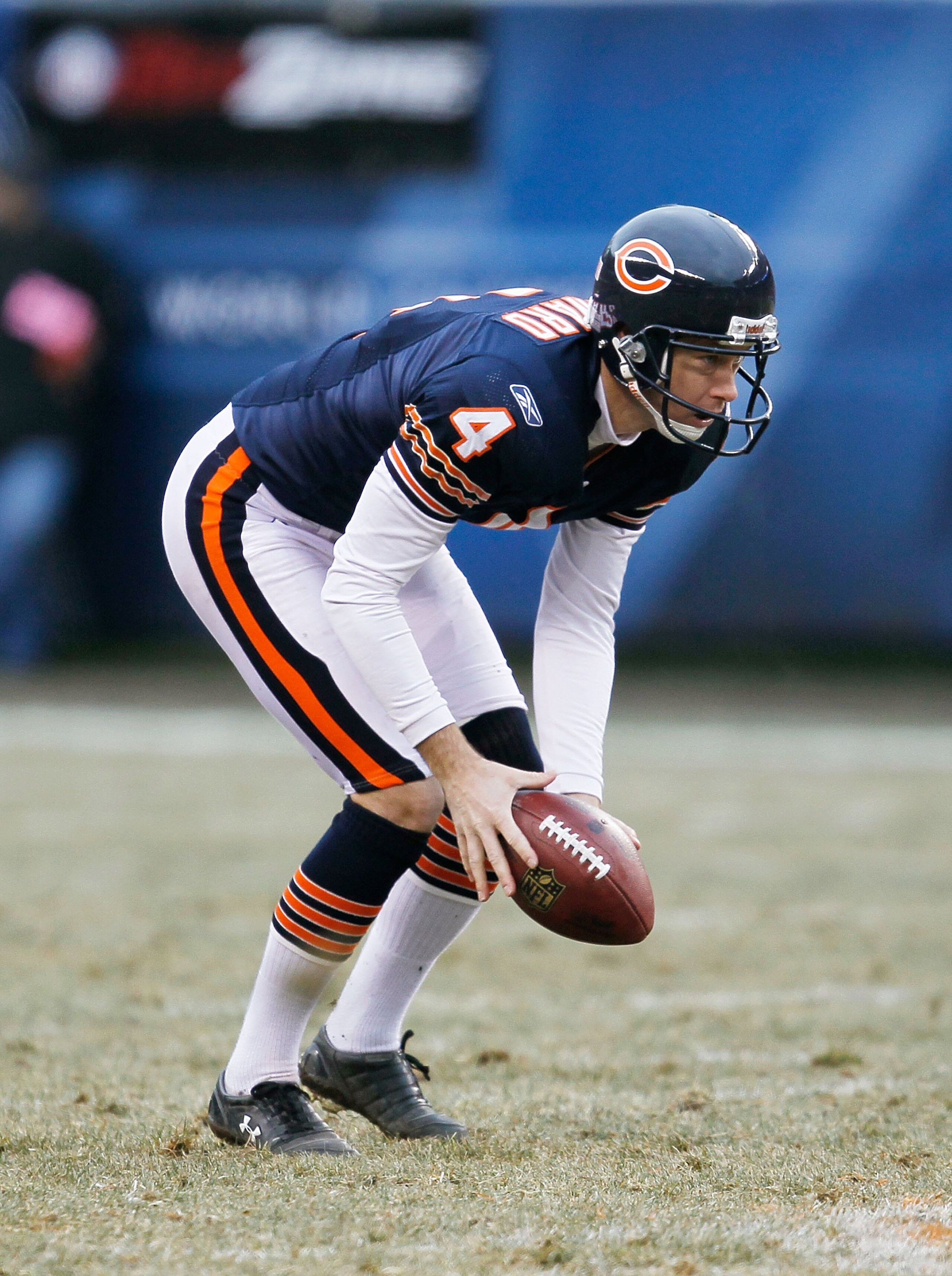 CHICAGO - DECEMBER 13: Brad Maynard #4 of the Chicago Bears catches a low snap before punting against the Green Bay Packers at Soldier Field on December 13, 2009 in Chicago, Illinois. The Packers defeated the Bears 21-14. (Photo by Jonathan Daniel/Getty I