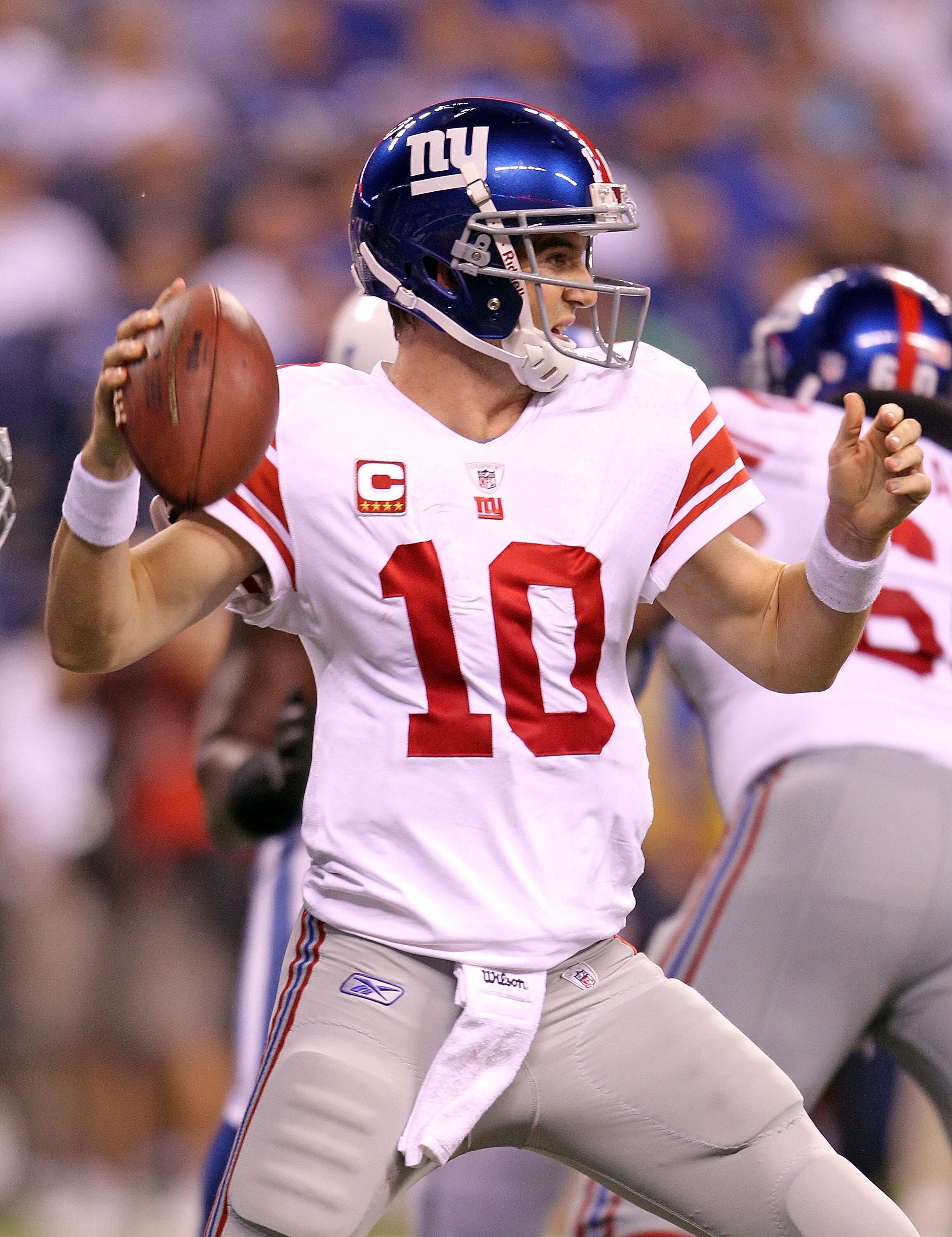 INDIANAPOLIS - SEPTEMBER 19:  Eli Manning #10  of the New York Giants throws a pass during the NFL game against the Indianapolis Colts at Lucas Oil Stadium on September 19, 2010 in Indianapolis, Indiana.  (Photo by Andy Lyons/Getty Images)