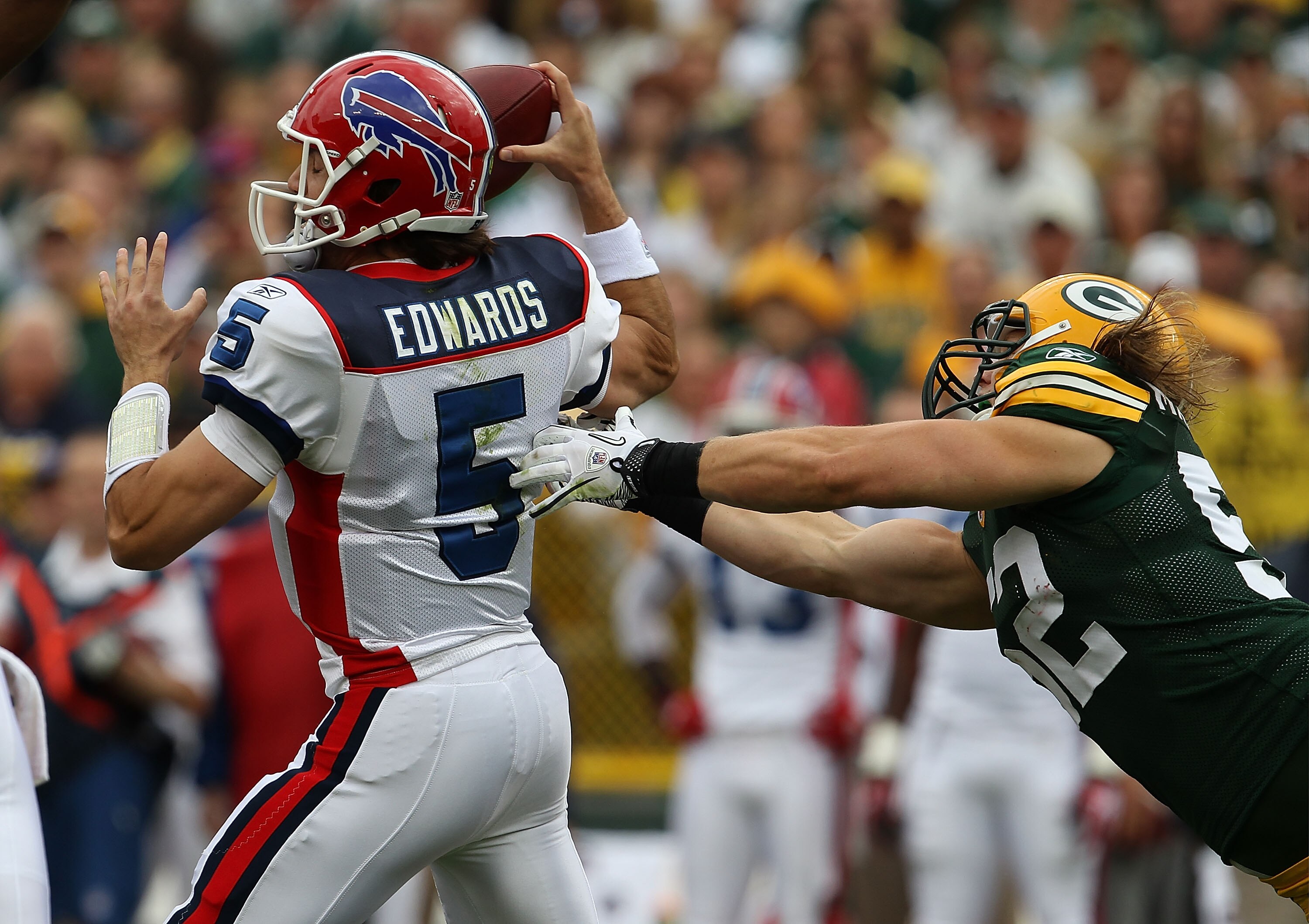 GREEN BAY, WI - SEPTEMBER 19: Trent Edwards #5 of the Buffalo Bills tries to avoid Clay Matthews #52 of the Green Bay Packers at Lambeau Field on September 19, 2010 in Green Bay, Wisconsin. The Packers defeated the Bills 34-7. (Photo by Jonathan Daniel/Ge