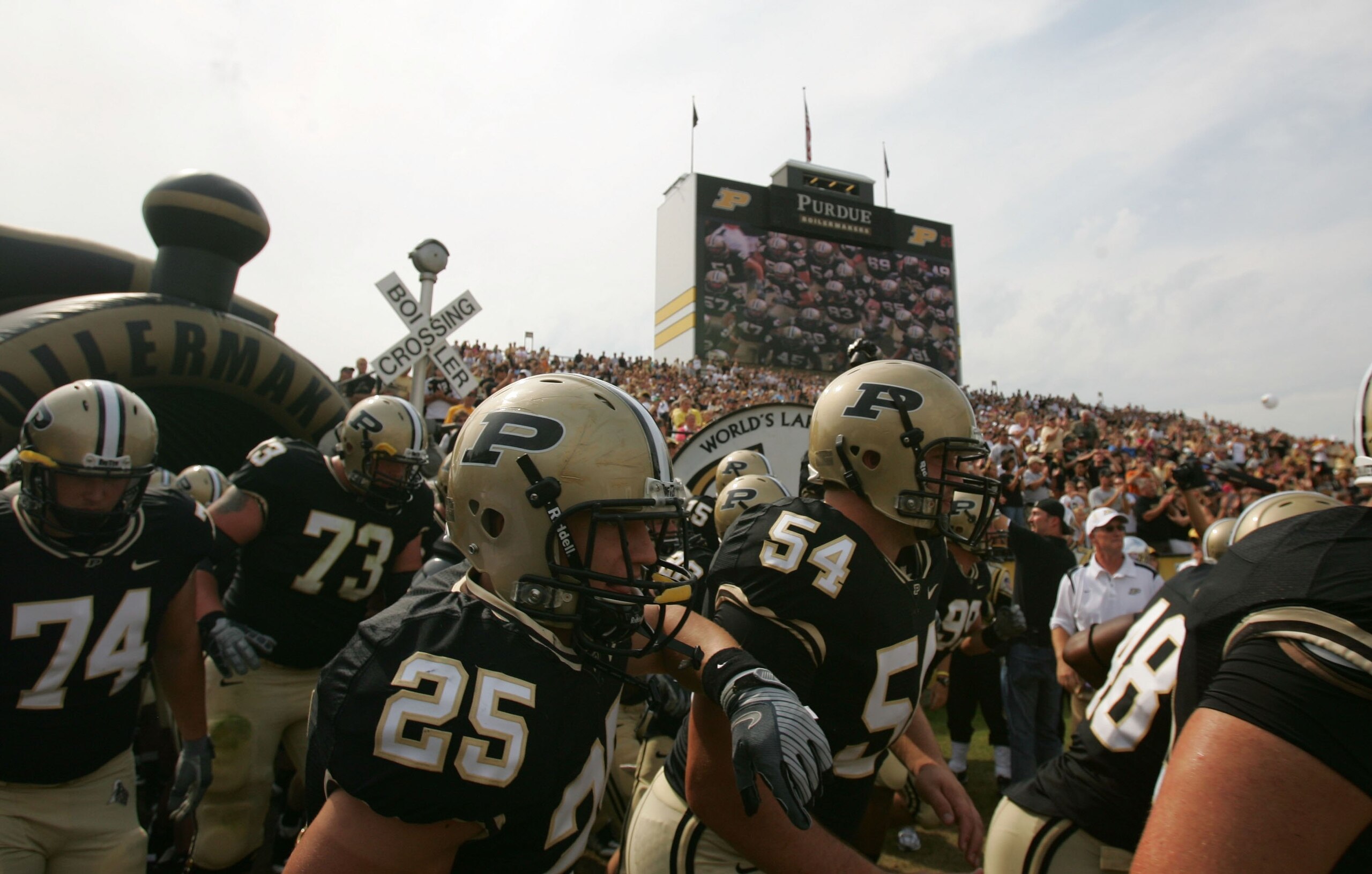 WEST LAFAYETTE, IN - SEPTEMBER 20: The Purdue Boilermakers run on the field before play against the Central Michigan Chippewas at Ross-Ade Stadium on September 20, 2008 in West Lafayette, Indiana. (Photo by Ronald Martinez/Getty Images) WEST LAFAYETTE, IN - SEPTEMBER 20: The Purdue Boilermakers run on the field before play against the Central Michigan Chippewas at Ross-Ade Stadium on September 20, 2008 in West Lafayette, Indiana. (Photo by Ronald Martinez/Getty Images)