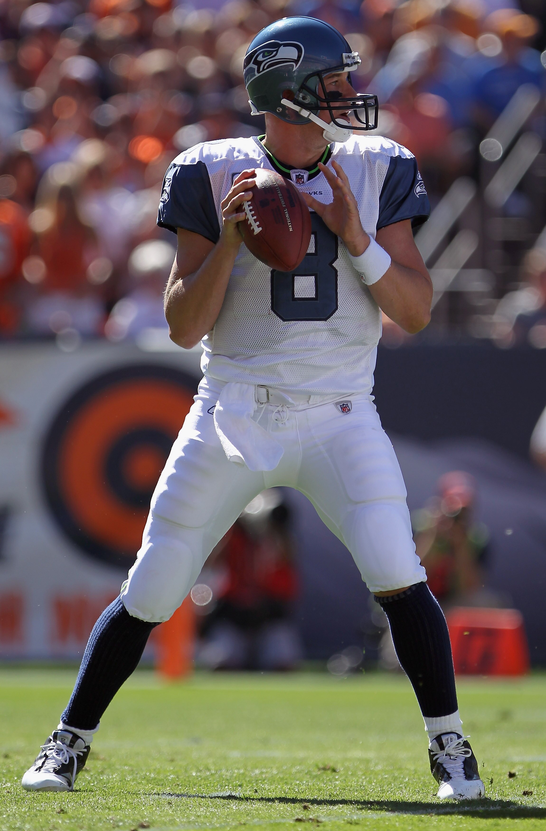 DENVER - SEPTEMBER 19:  Quarterback Matt Hasselbeck #8 of the Seattle Seahawks delivers a pass against the Denver Broncos at INVESCO Field at Mile High on September 19, 2010 in Denver, Colorado. The Broncos defeated the Seahawks 31-14.  (Photo by Doug Pen