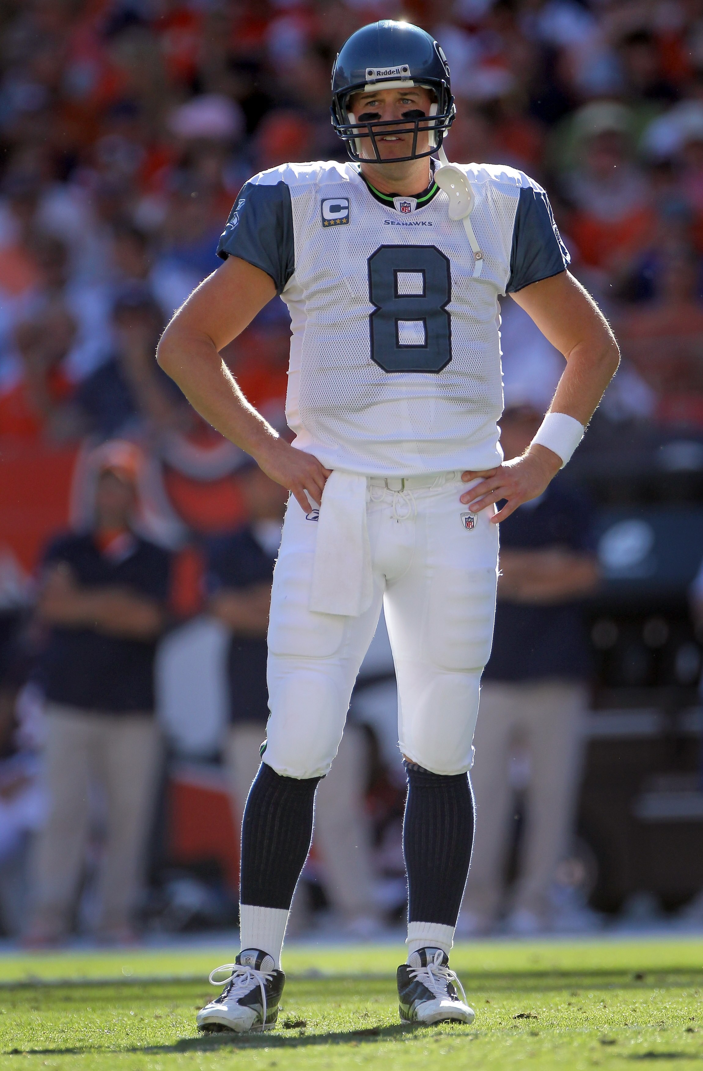 DENVER - SEPTEMBER 19:  Quarterback Matt Hasselbeck #8 of the Seattle Seahawks looks on during a break in the action against the Denver Broncos at INVESCO Field at Mile High on September 19, 2010 in Denver, Colorado. The Broncos defeated the Seahawks 31-1