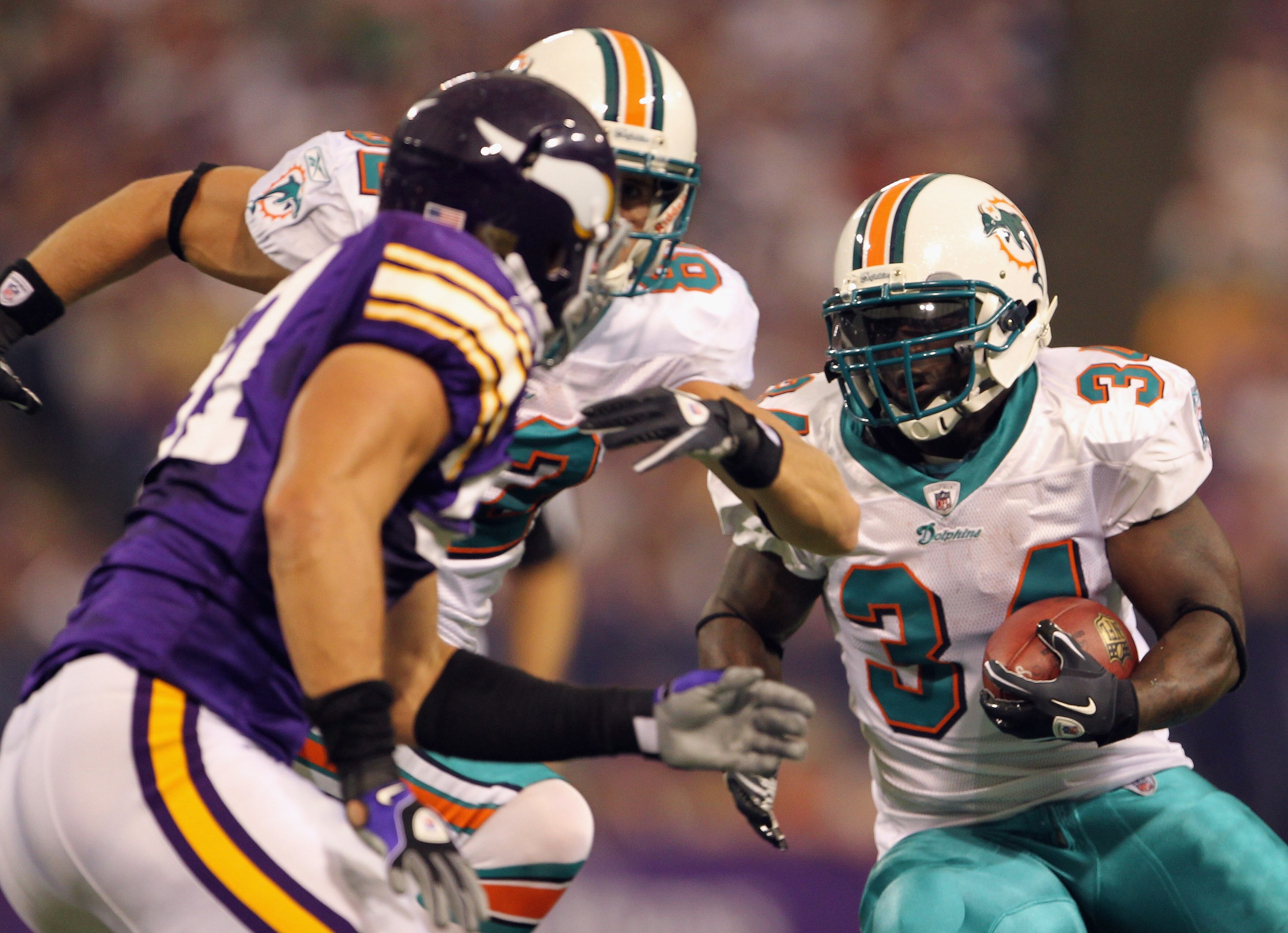 MINNEAPOLIS - SEPTEMBER 19:  Ricky Williams #34 of the Miami Dolphins carries the ball during the game against the Minnesota Vikings on September 19, 2010 at Hubert H. Humphrey Metrodome in Minneapolis, Minnesota.  (Photo by Jamie Squire/Getty Images)