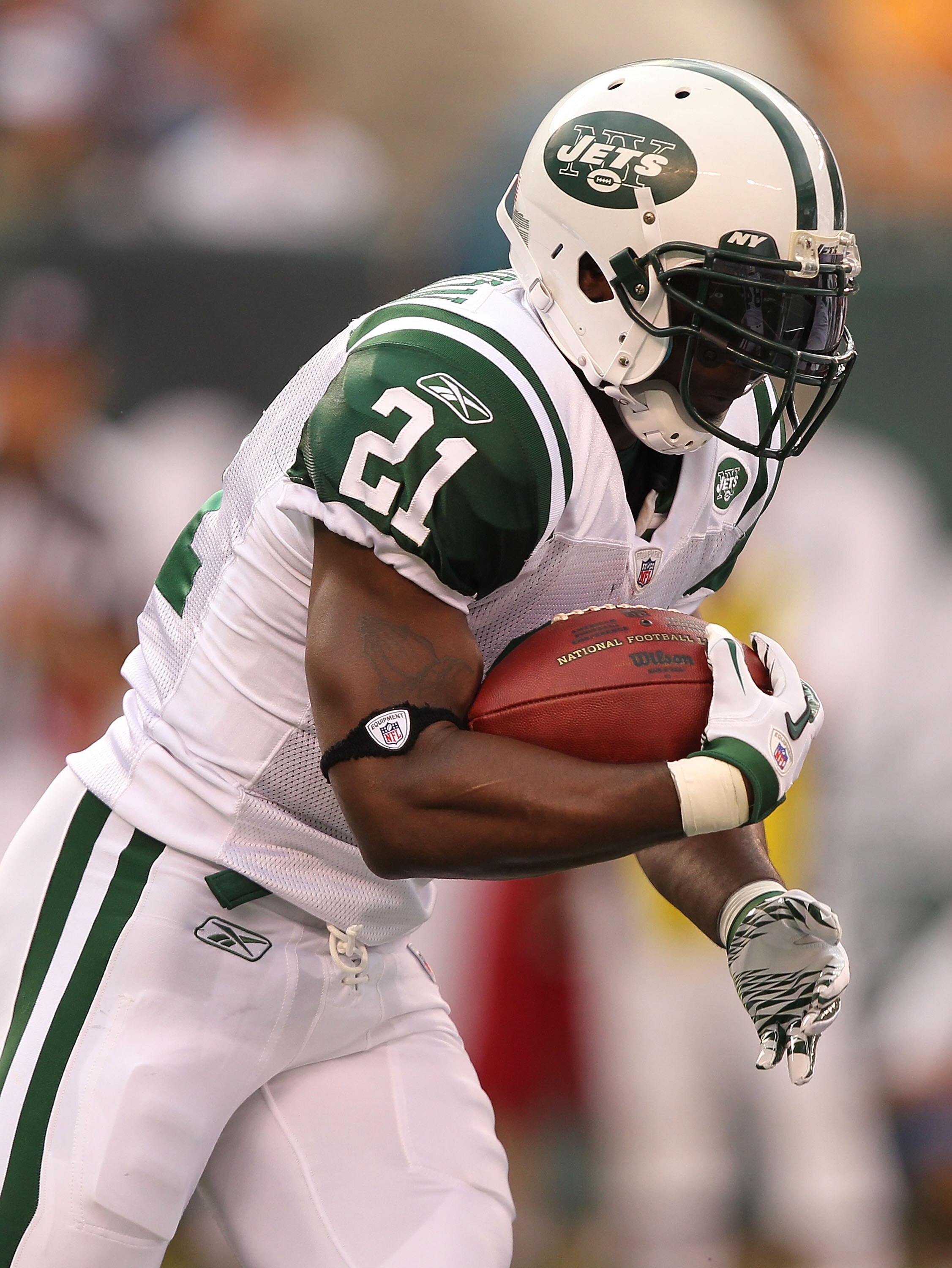 EAST RUTHERFORD, NJ - SEPTEMBER 19:  LaDainian Tomlinson #21  of the New York Jetsin action against  the New England Patriots during their  game on September 19, 2010 at the New Meadowlands Stadium  in East Rutherford, New Jersey.  (Photo by Al Bello/Gett