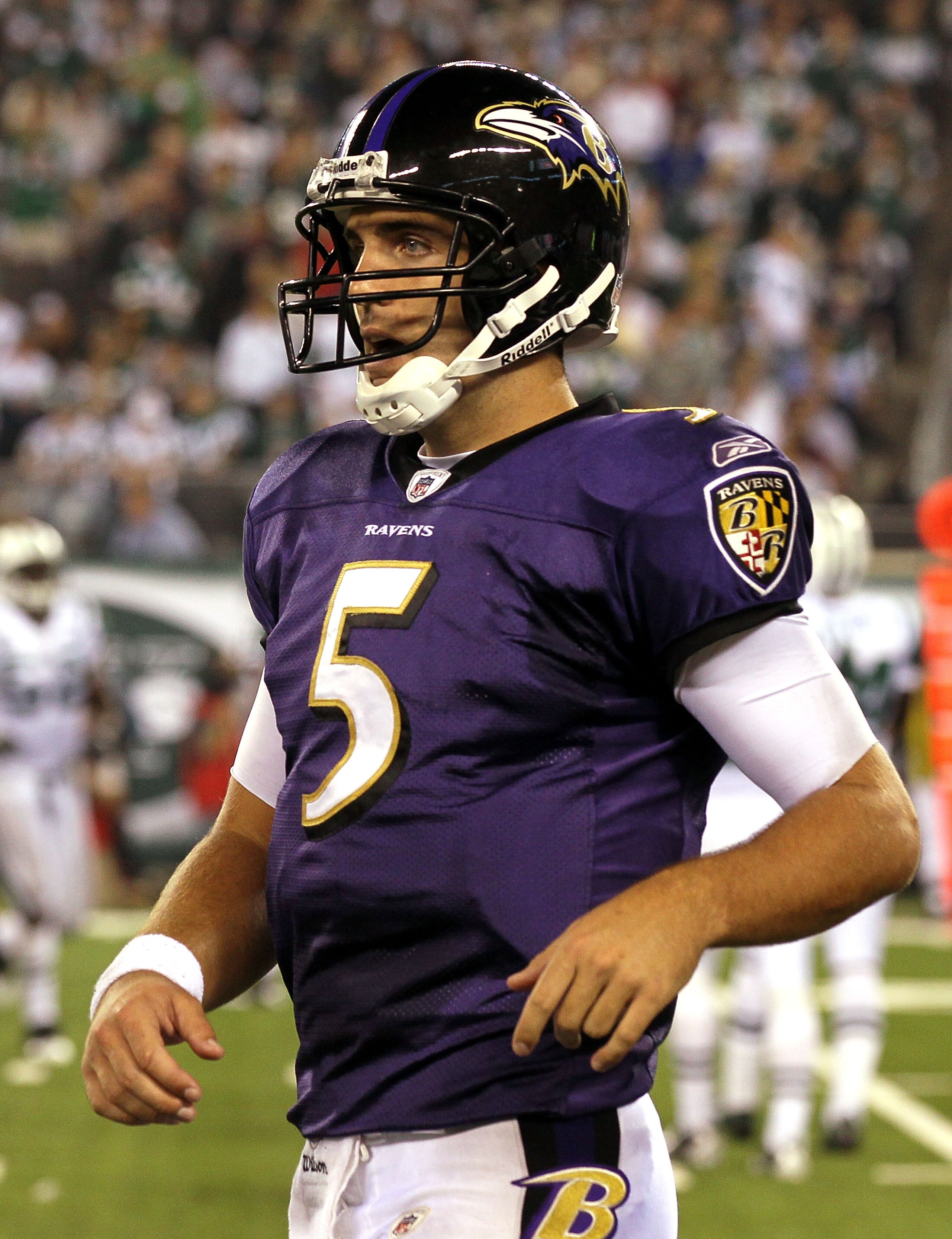 EAST RUTHERFORD, NJ - SEPTEMBER 13:  Joe Flacco #5 of the Baltimore Ravens looks on against the New York Jets during the home opener at the New Meadowlands Stadium on September 13, 2010 in East Rutherford, New Jersey.  (Photo by Jim McIsaac/Getty Images)