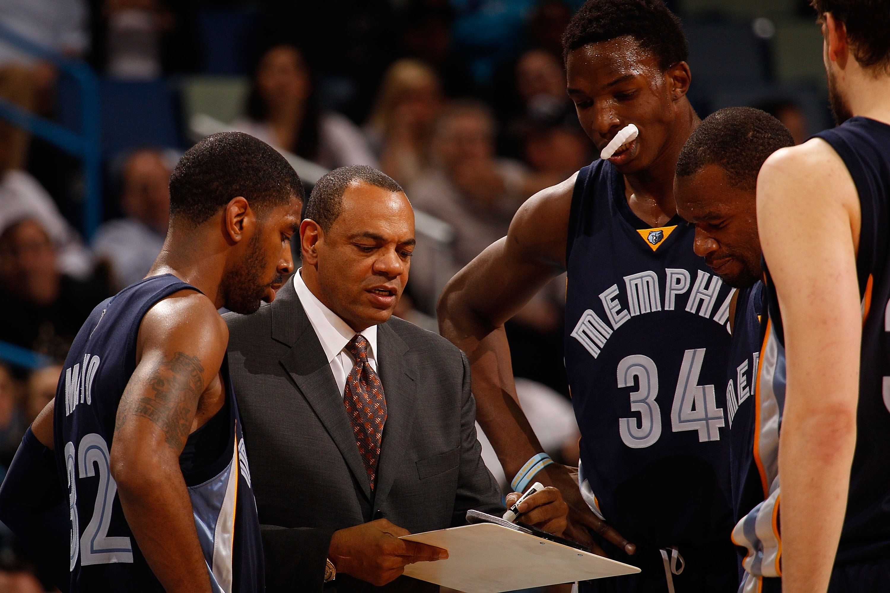 NEW ORLEANS - JANUARY 20:  Head coach Lionel Hollins of the Memphis Grizzlies talks with his players during a timeout against the New Orleans Hornets at the New Orleans Arena on January 20, 2010 in New Orleans, Louisiana.  The Hornets defeated the Grizzli