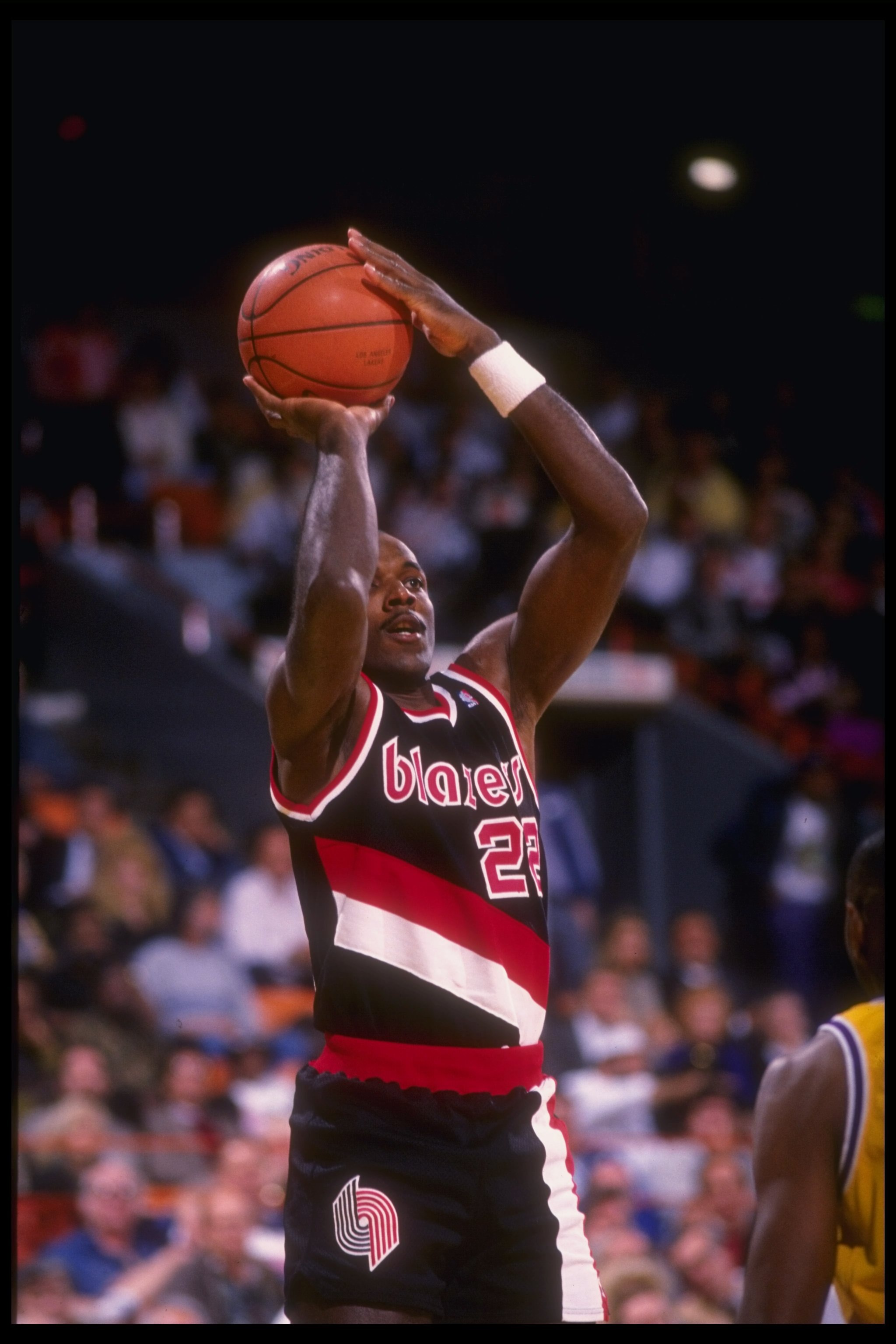 Guard Clyde Drexler of the Portland Trail Blazers shoots the ball during a game against the Los Angeles Lakers at the Rose Garden in Portland, Oregon.