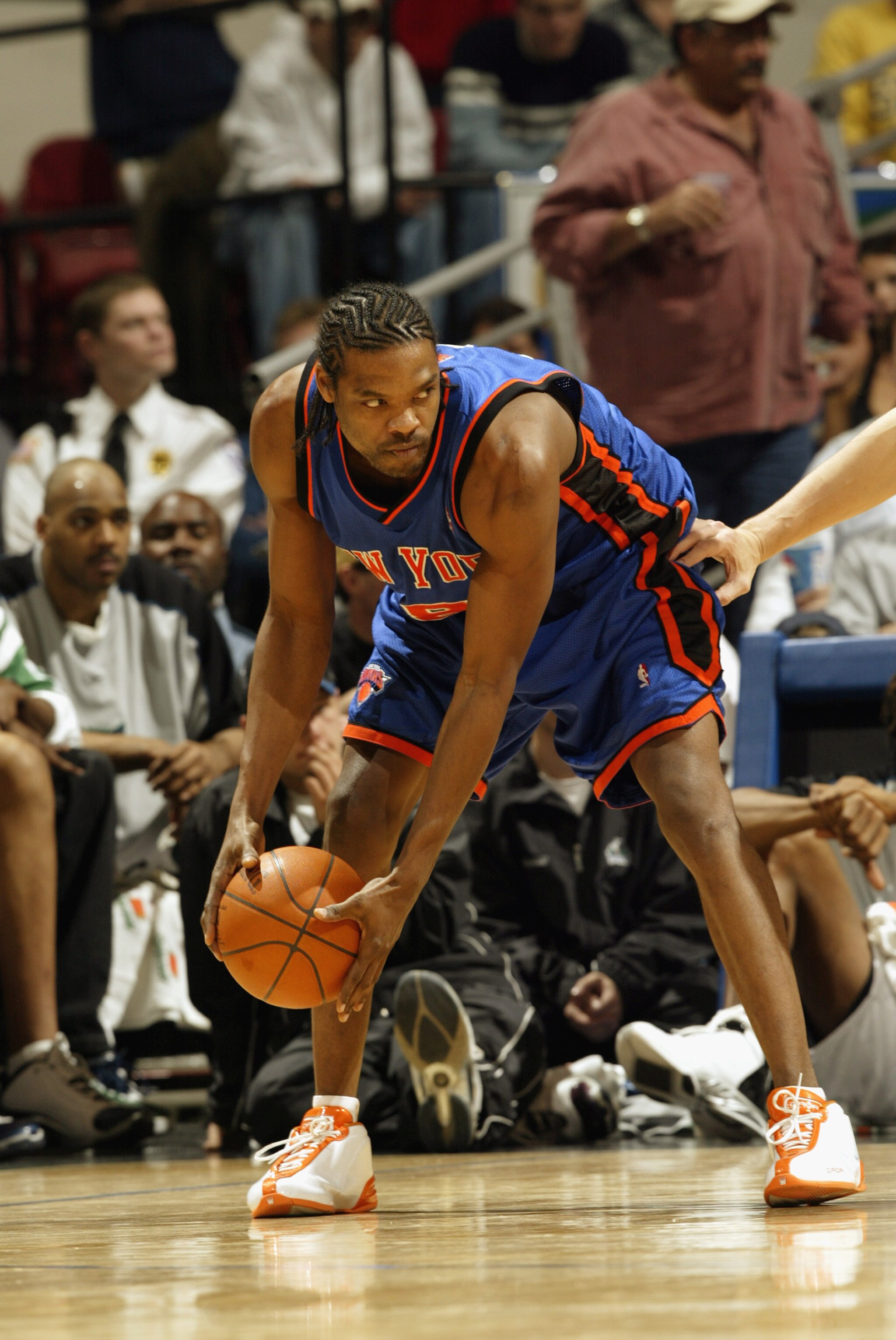 MINNEAPOLIS - MARCH 2:  Latrell Sprewell #8 of the New York Knicks looks to play the ball against the Minnesota Timberwolves during the game at Target Center on March 2, 2003 in Minneapolis, Minnesota.  The Timberwolves won 99-90.  NOTE TO USER: User expr