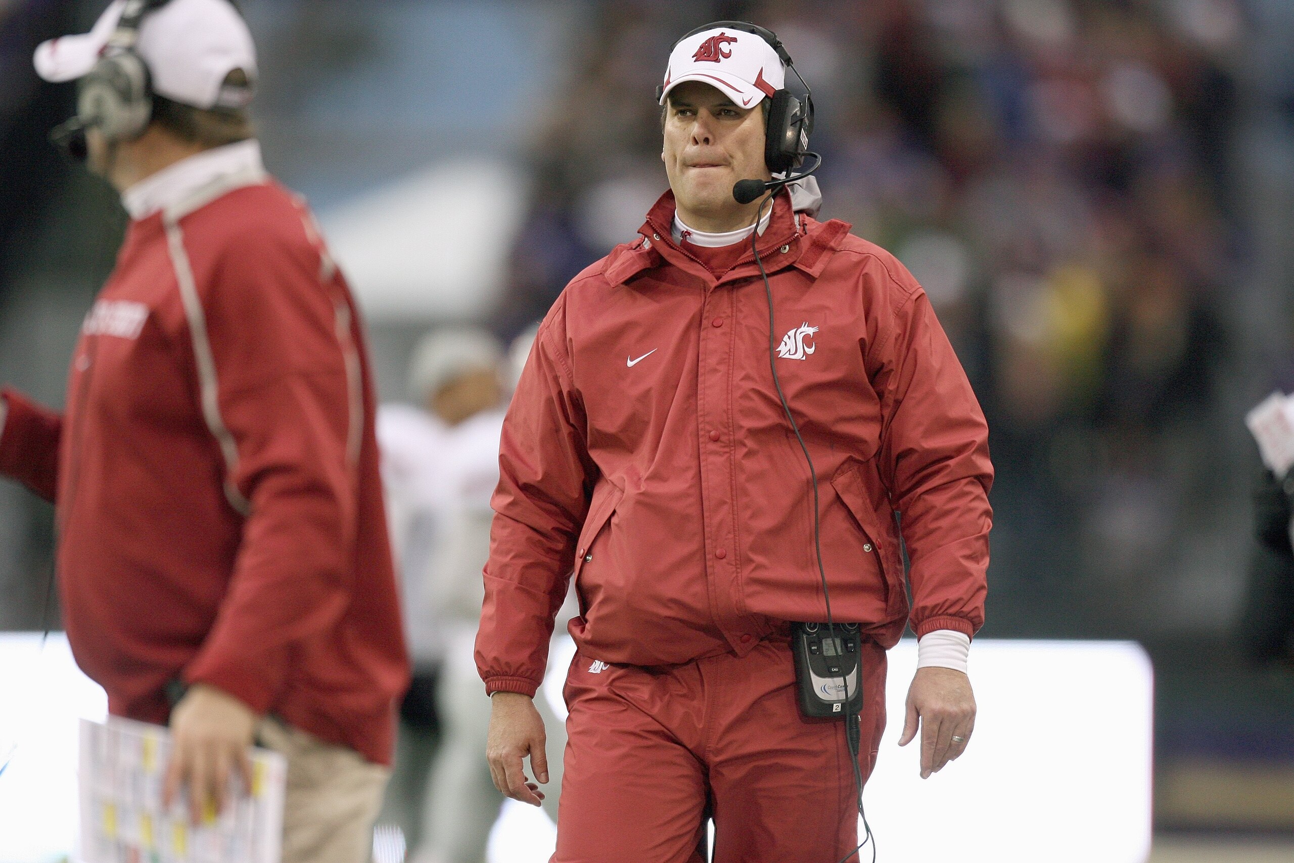 SEATTLE - NOVEMBER 28: Head coach Paul Wulff of the Washington State Cougars walks on the field during the game against the Washington Huskies on November 28, 2009 at Husky Stadium in Seattle, Washington. The Huskies defeated the Cougars 30-0. (Photo by O