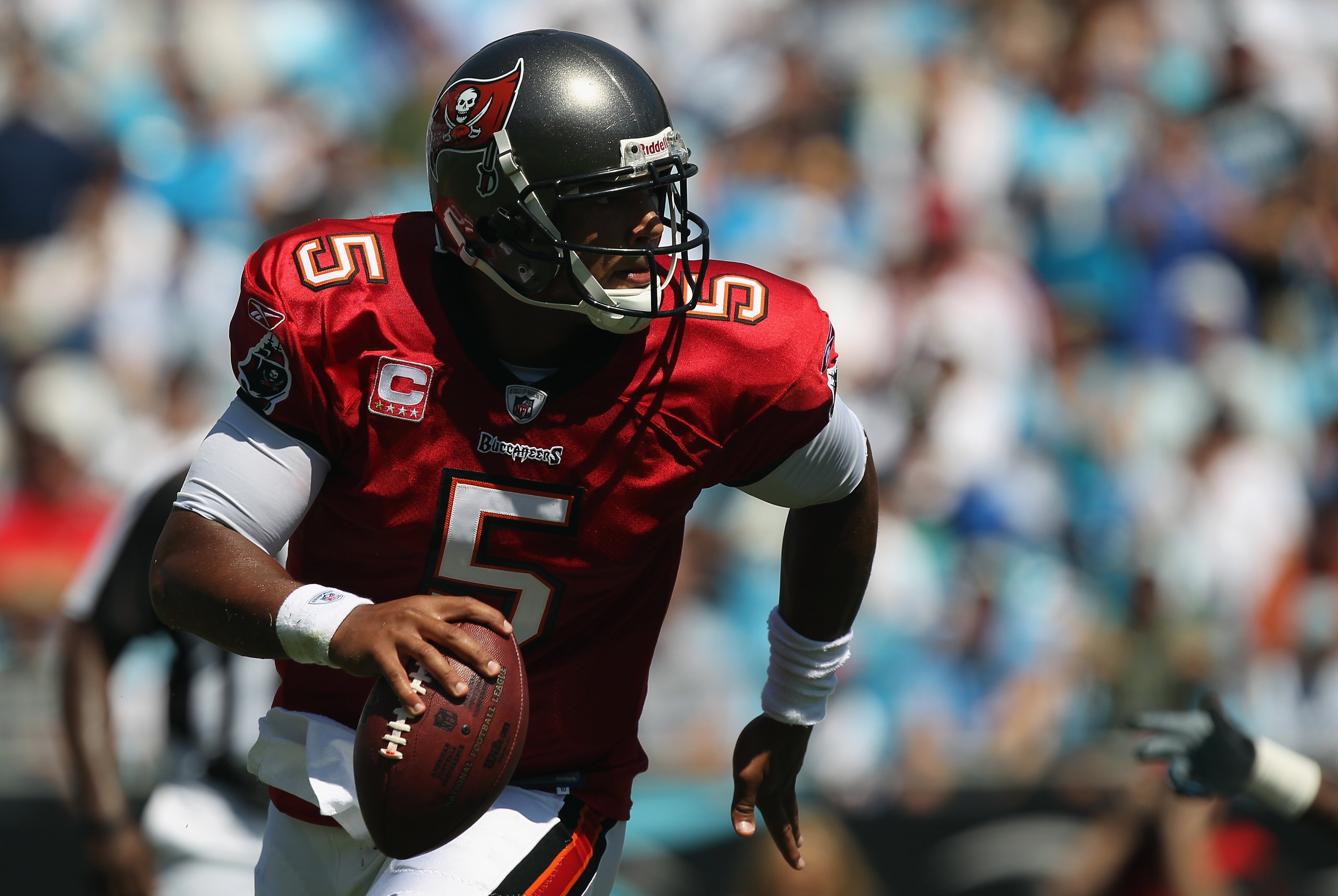 CHARLOTTE, NC - SEPTEMBER 19:  Josh Freeman #5 of the Tampa Bay Buccaneers against the Carolina Panthers during their game at Bank of America Stadium on September 19, 2010 in Charlotte, North Carolina.  (Photo by Streeter Lecka/Getty Images)