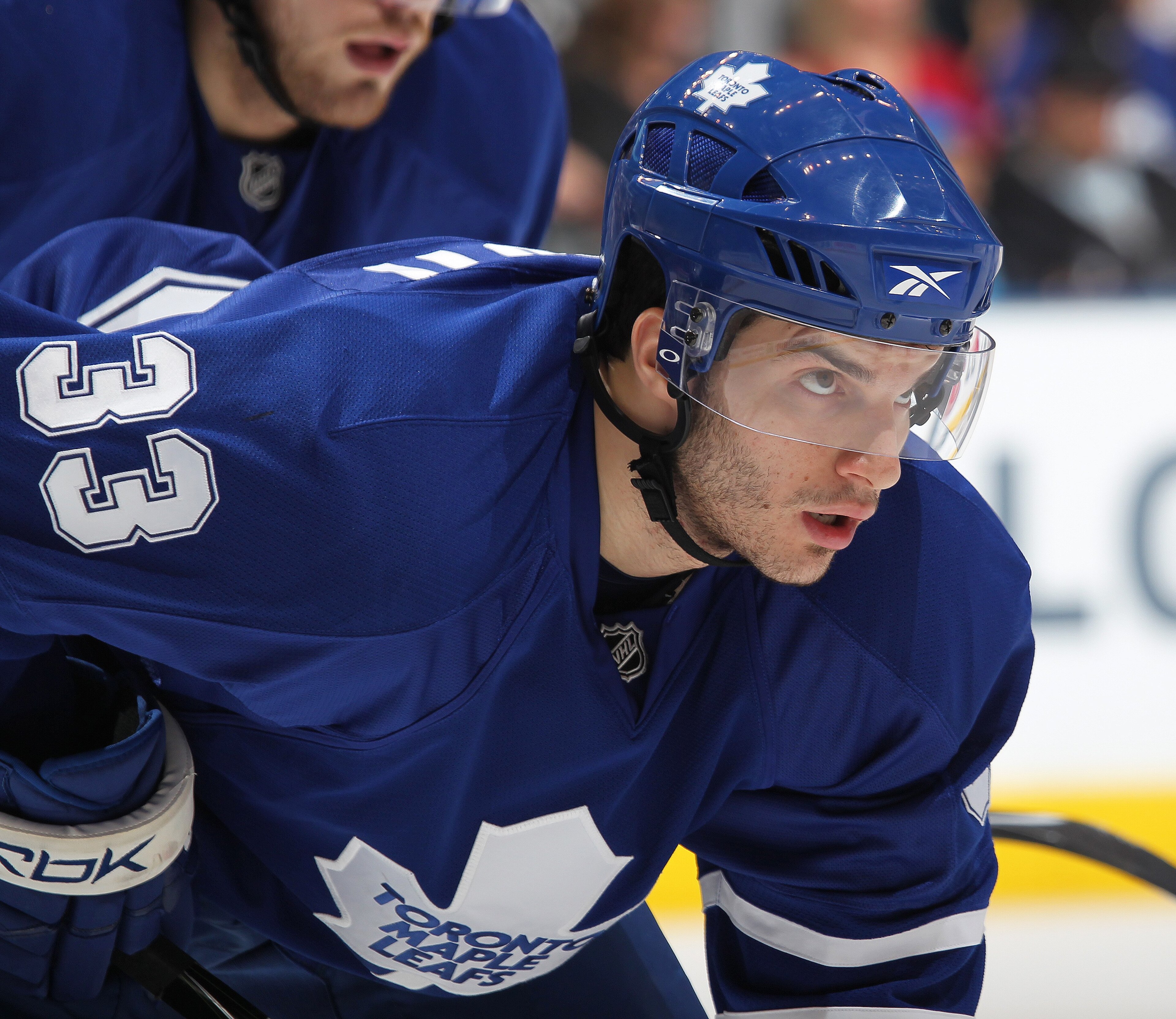 TORONTO, ON - MARCH 13:  Luca Caputi #33 of the Toronto Maple Leafs waits for a faceoff in a game against the Edmonton Oilers on March 13, 2010 at the Air Canada Centre in Toronto, Ontario. The Leafs defeated the Oilers 6-4. (Photo by Claus Andersen/Getty