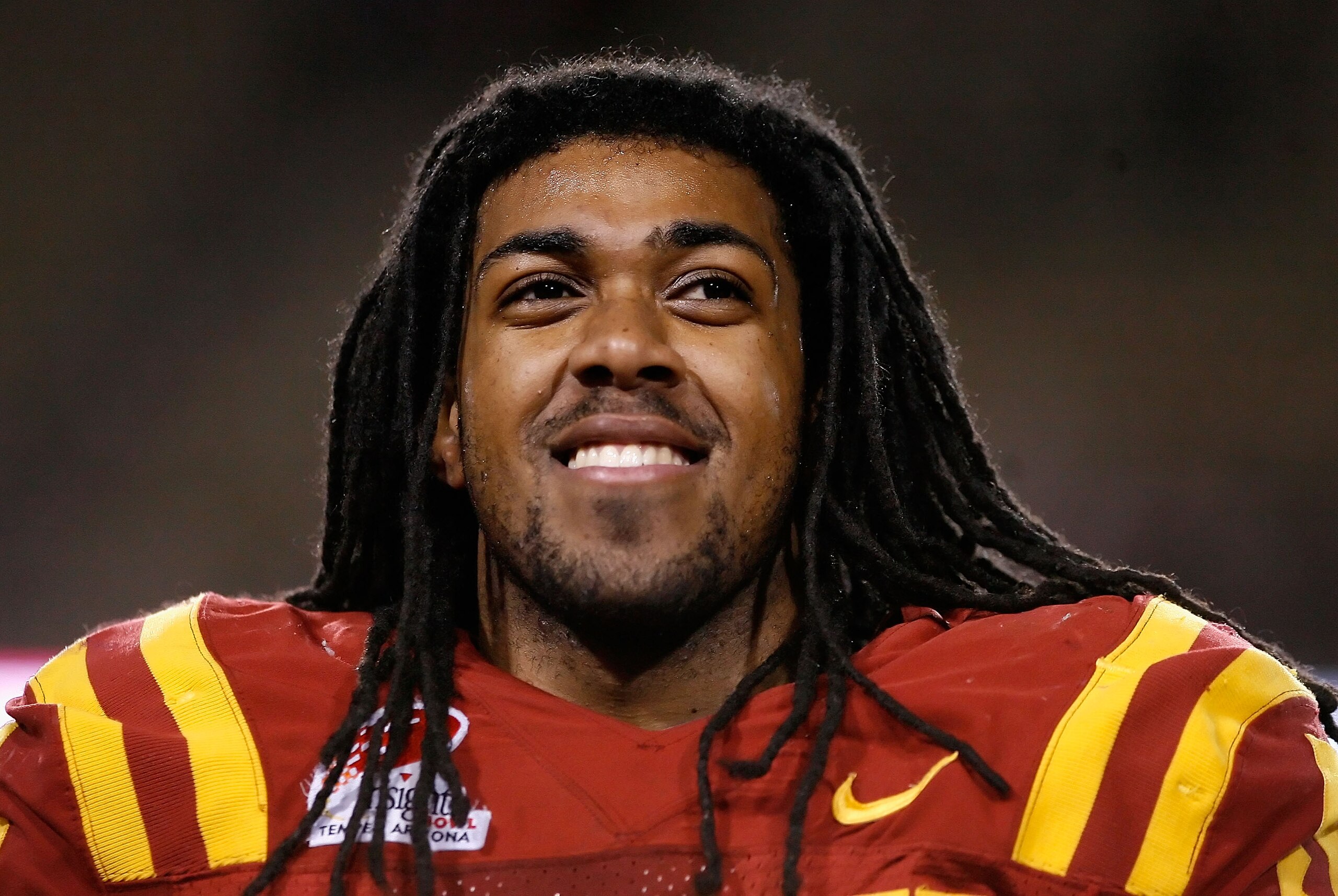 TEMPE, AZ - DECEMBER 31:  Defensive player of the game Christopher Lyle #55 of the Minnesota Golden Gophers smiles after the Insight Bowl against the Iowa State Cyclones at Arizona Stadium on December 31, 2009 in Tempe, Arizona. The Cyclones defeated the