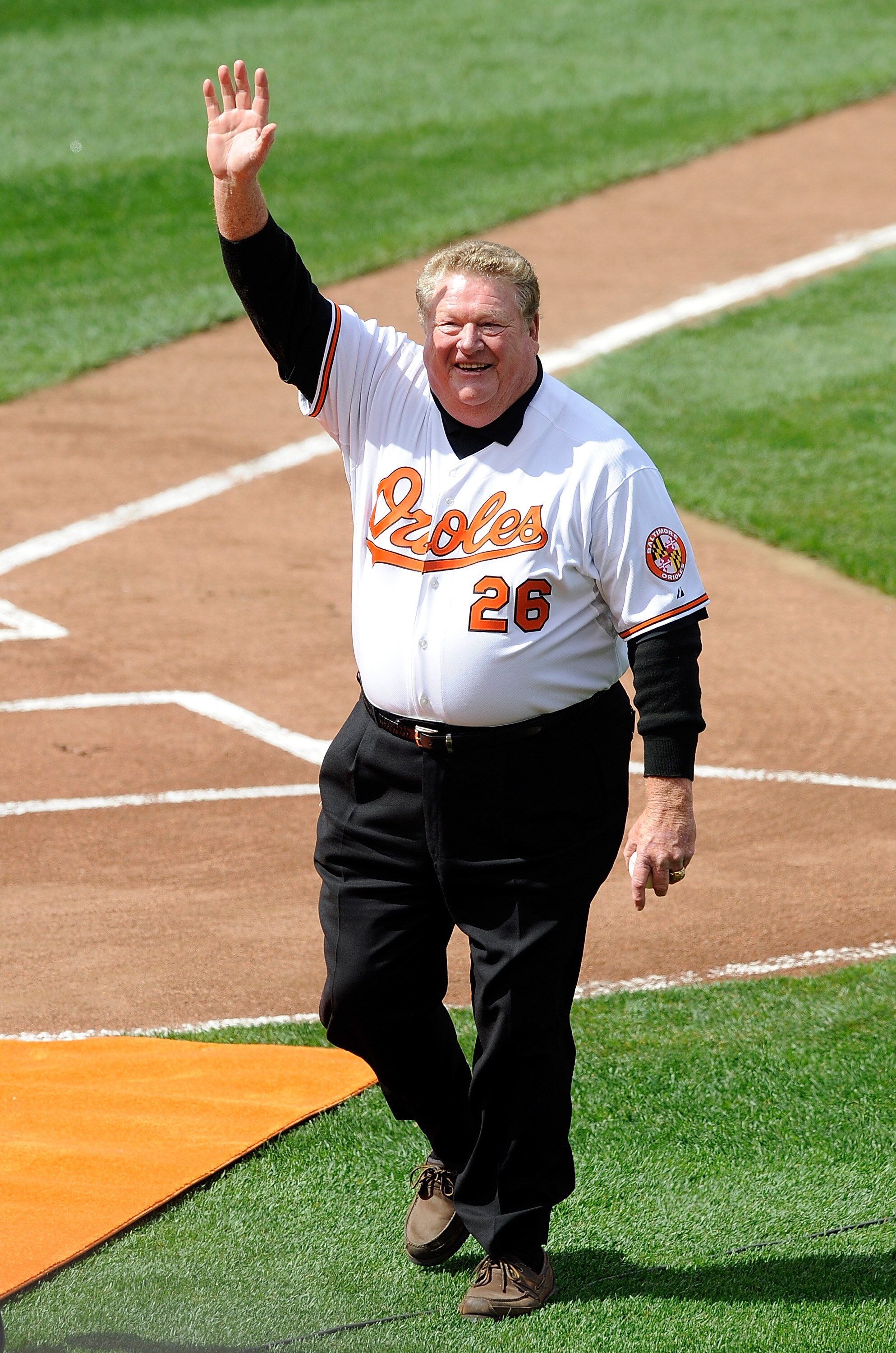 BALTIMORE - APRIL 09:  Boog Powell waves to the crowd after throwing out the first pitch before the game between the Baltimore Orioles and the Toronto Blue Jays on Opening Day at Camden Yards on April 9, 2010 in Baltimore, Maryland.  (Photo by Greg Fiume/
