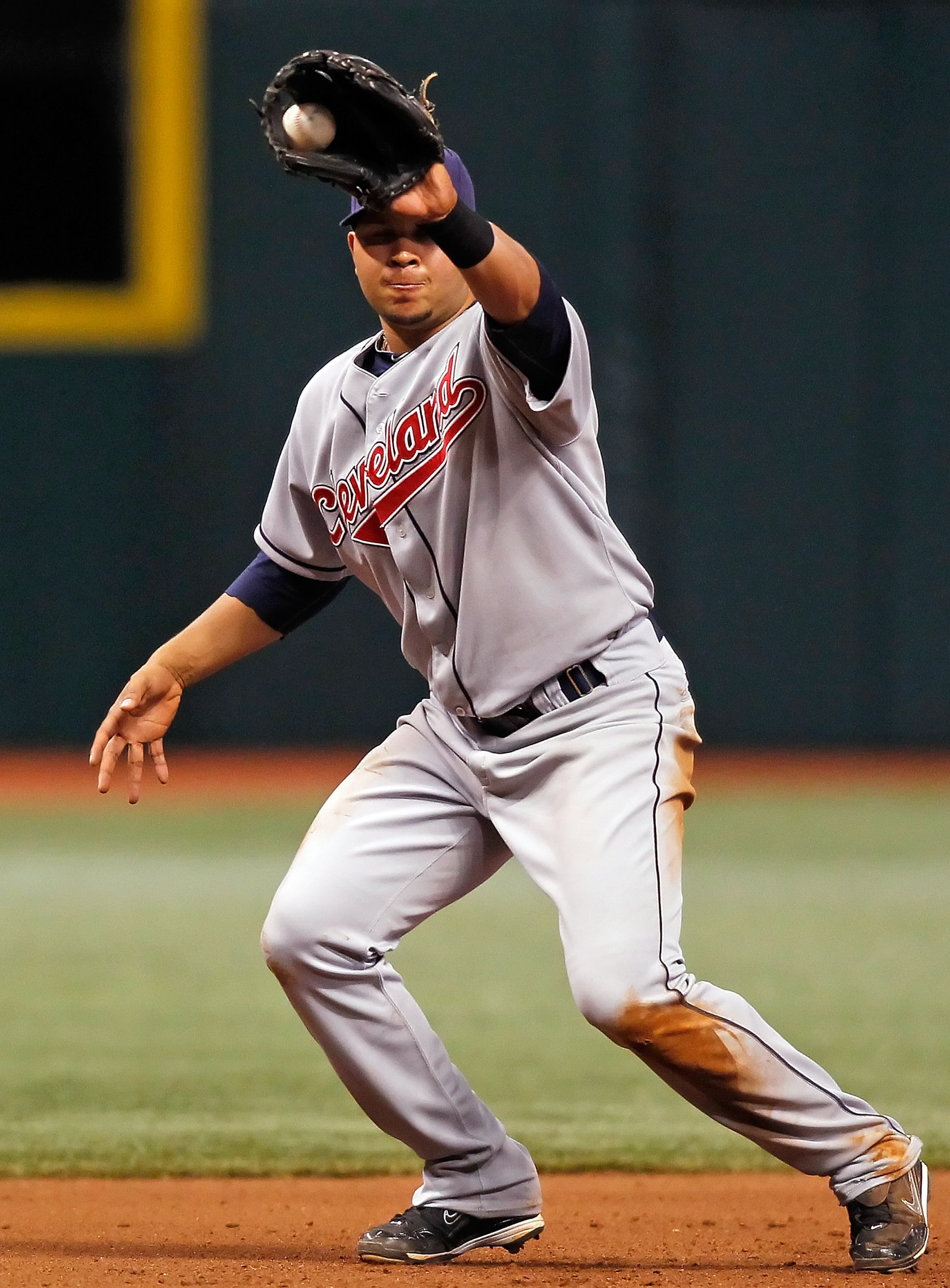 ST PETERSBURG, FL - MAY 17:  Infielder Jhonny Peralta #2 of the Cleveland Indians catches a line drive at third against the Tampa Bay Rays during the game at Tropicana Field on May 17, 2010 in St. Petersburg, Florida.  (Photo by J. Meric/Getty Images)