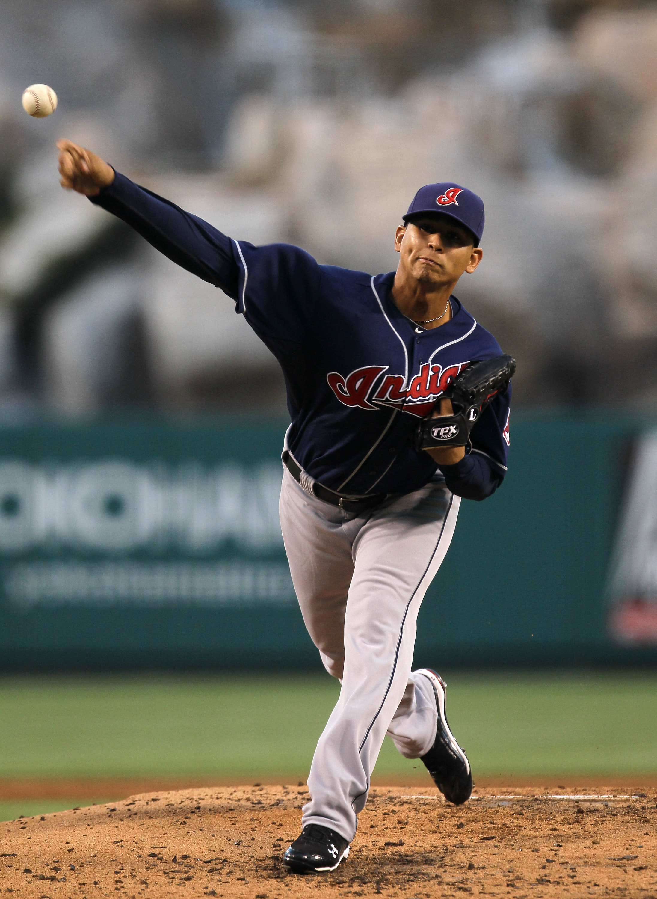 ANAHEIM, CA - SEPTEMBER 06:  Carlos Carrasco #59 of the Cleveland Indians throws a pitch against the Los Angeles Angels of Anaheim on September 6, 2010 at Angel Stadium in Anaheim, California.  (Photo by Stephen Dunn/Getty Images)