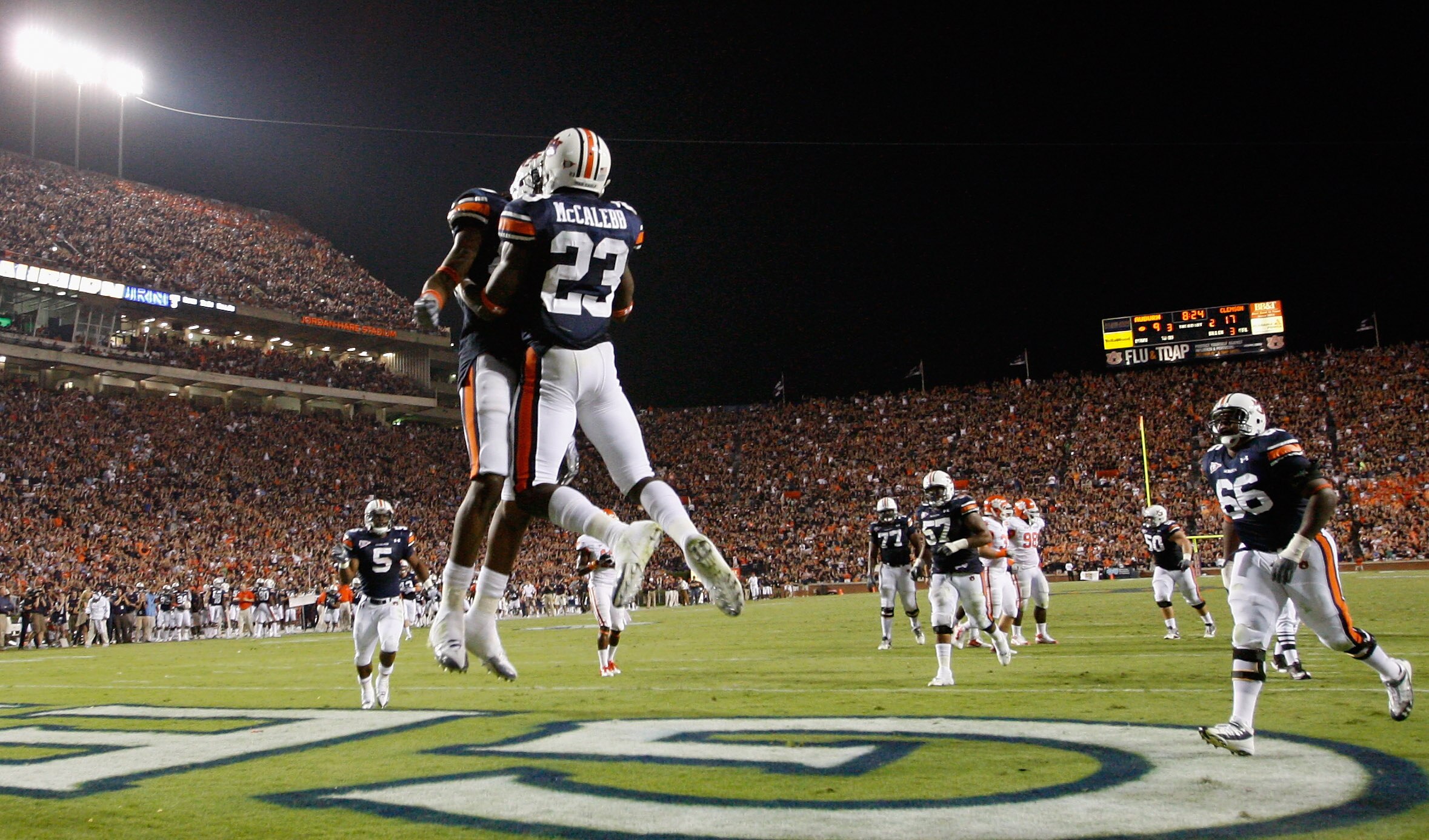 AUBURN, AL - SEPTEMBER 18:  Onterio McCalebb #23 of the Auburn Tigers celebrates his touchdown against the Clemson Tigers with Darvin Adams #89 at Jordan-Hare Stadium on September 18, 2010 in Auburn, Alabama.  (Photo by Kevin C. Cox/Getty Images)