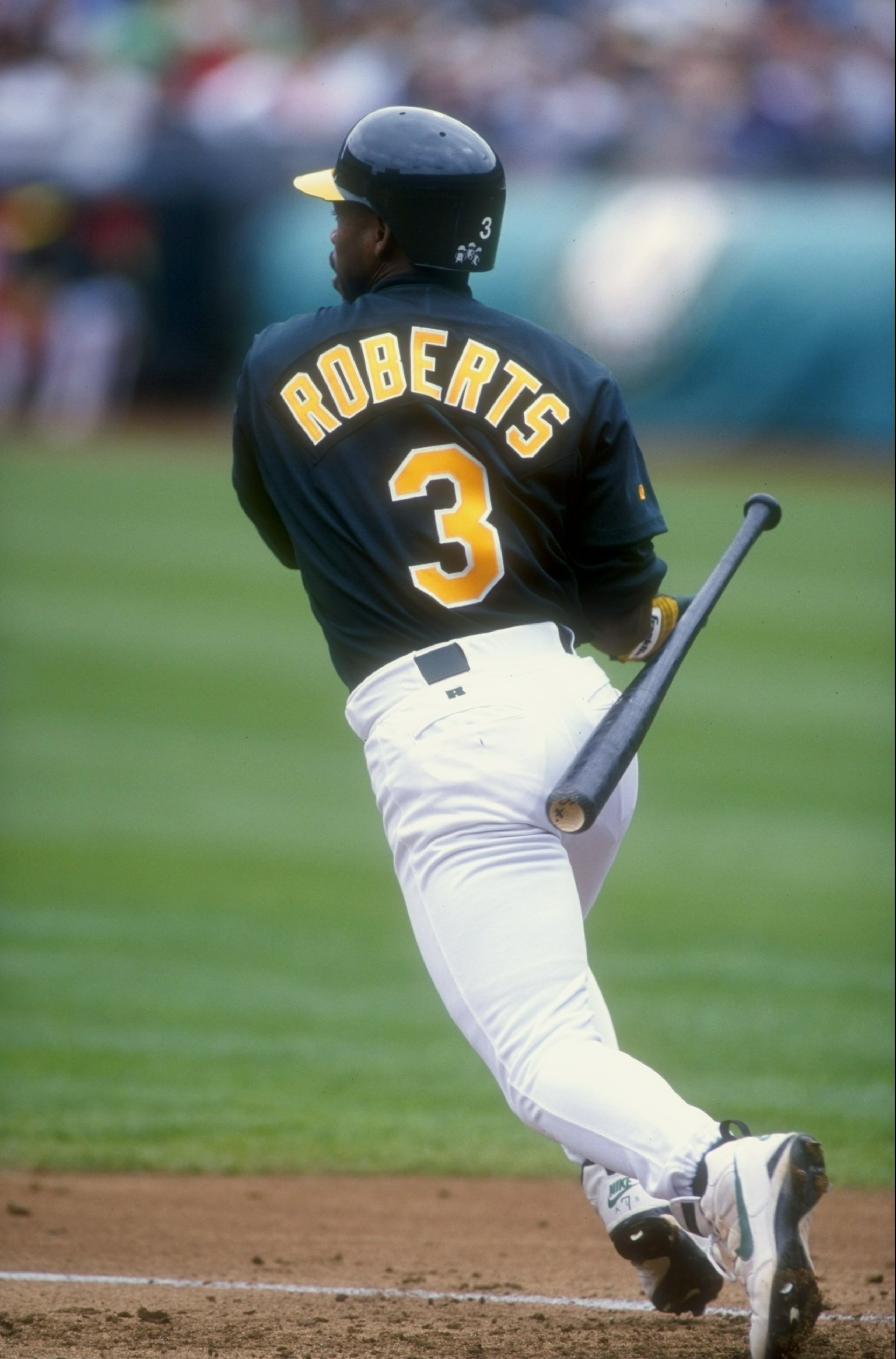 30 Jun 1998:  Bip Roberts #3 of the Oakland Athletics drops his bat behind him during the interleague game against the San Diego Padres at Oakland Coliseum in Oakland, California. The A''s defeated teh Padres 12-10