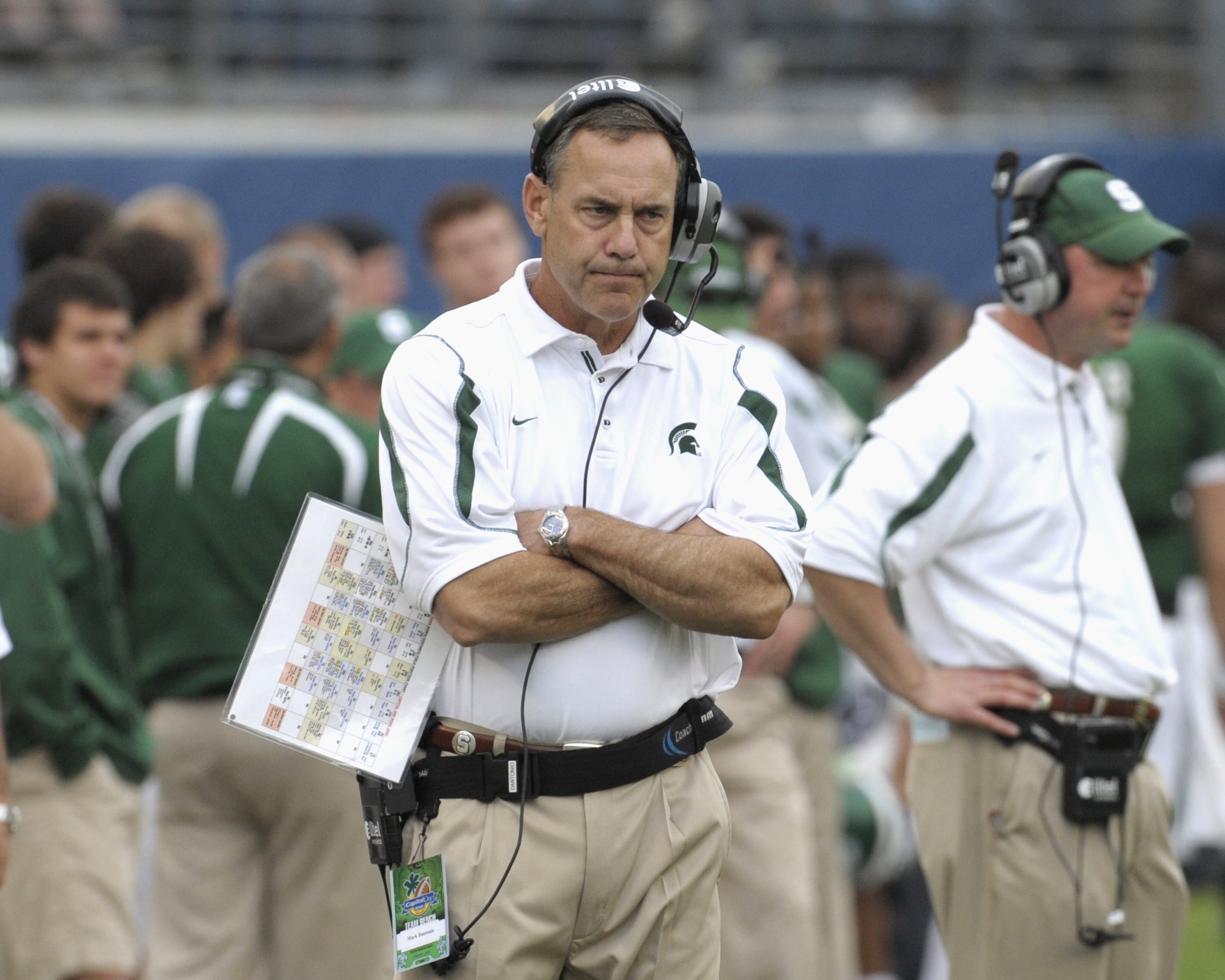 ORLANDO, FL - JANUARY 1: Coach Mark Dantonio of the Michigan State Spartans directs play against the Georgia Bulldogs at the 2009 Capital One Bowl at the Citrus Bowl on January 1, 2009 in Orlando, Florida.  (Photo by Al Messerschmidt/Getty Images)