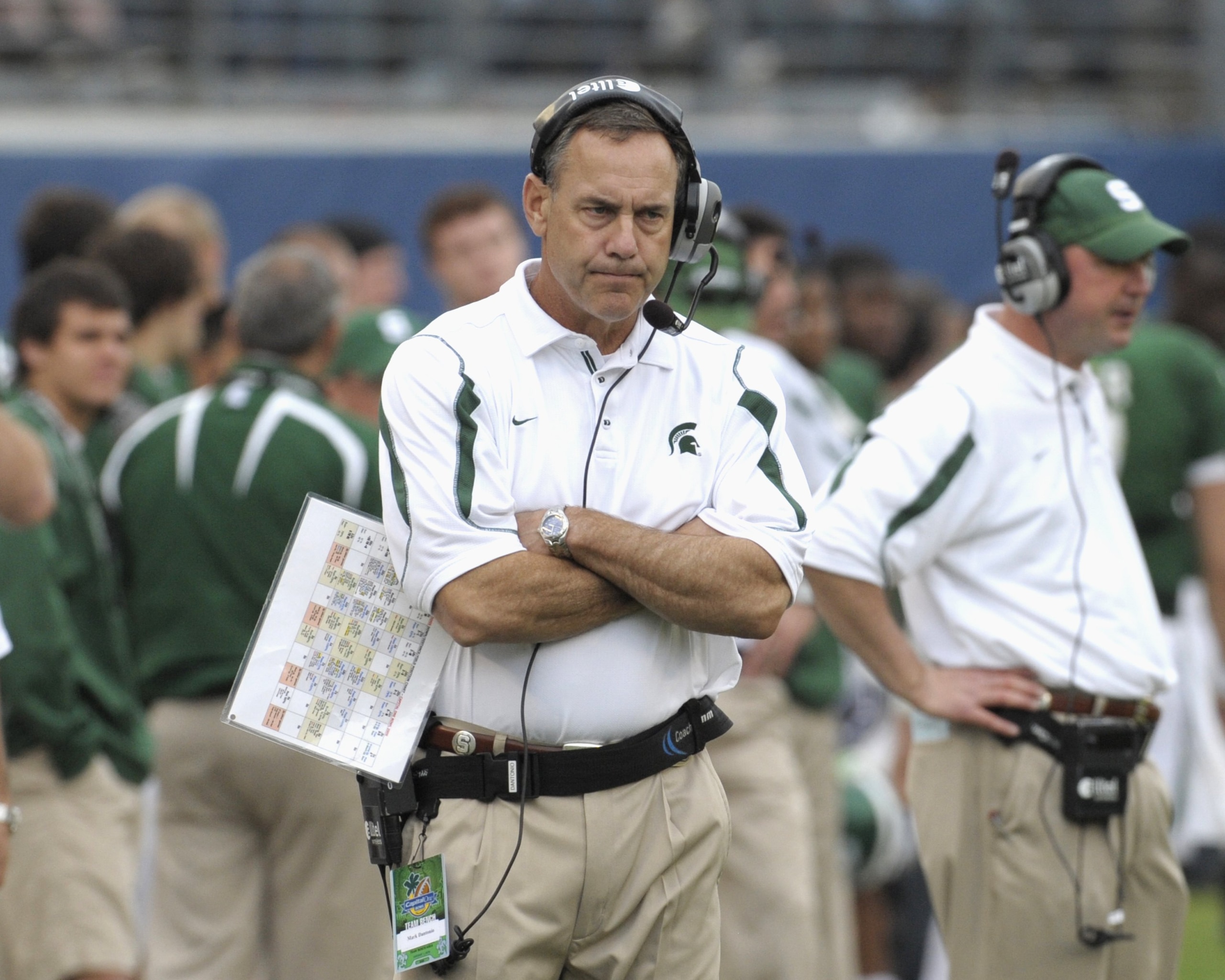 ORLANDO, FL - JANUARY 1: Coach Mark Dantonio of the Michigan State Spartans directs play against the Georgia Bulldogs at the 2009 Capital One Bowl at the Citrus Bowl on January 1, 2009 in Orlando, Florida.  (Photo by Al Messerschmidt/Getty Images)