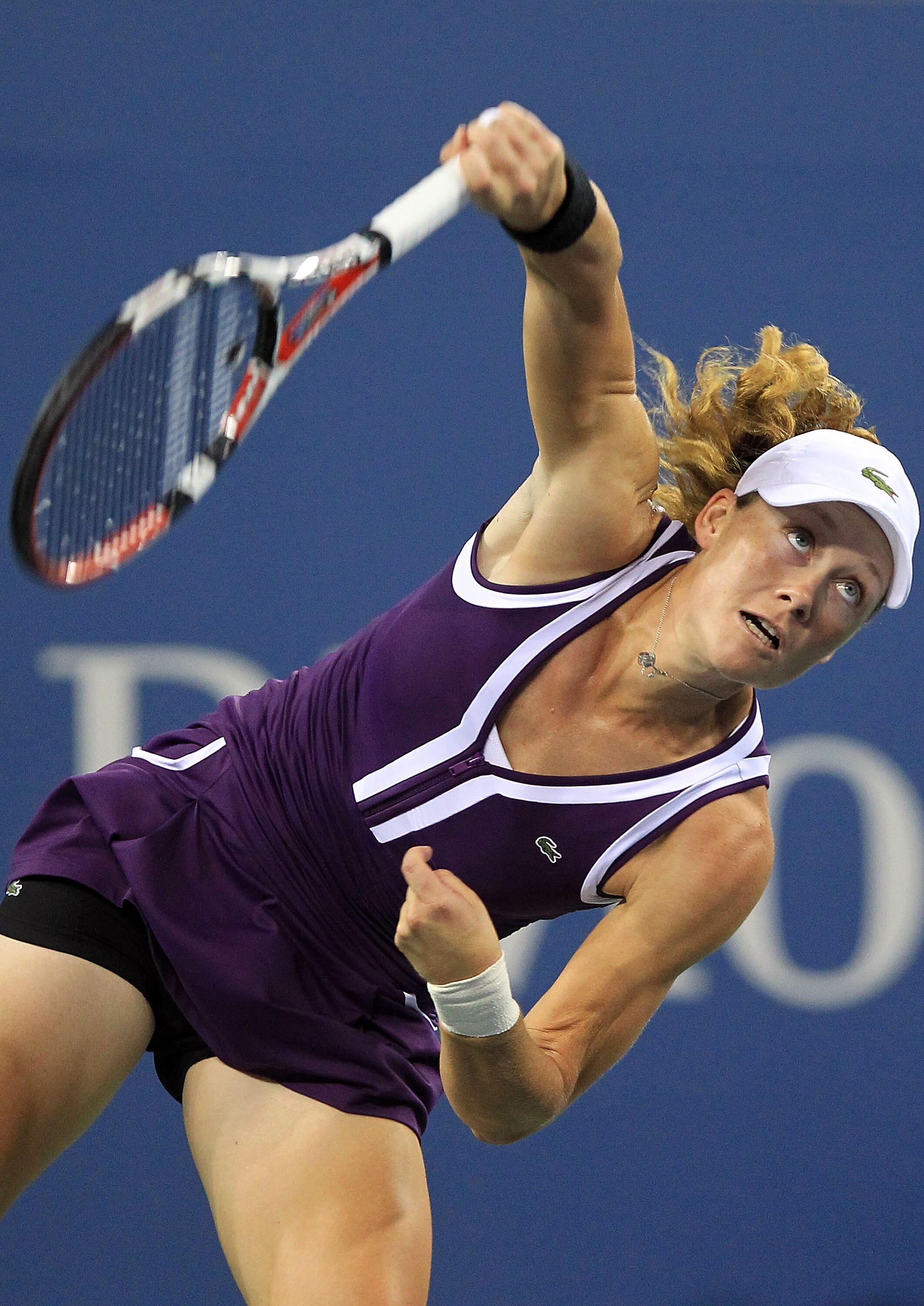 NEW YORK - SEPTEMBER 07:  Samantha Stosur of Australia serves against Kim Clijsters of Belgium during day nine of the 2010 U.S. Open at the USTA Billie Jean King National Tennis Center on September 7, 2010 in the Flushing neighborhood of the Queens boroug