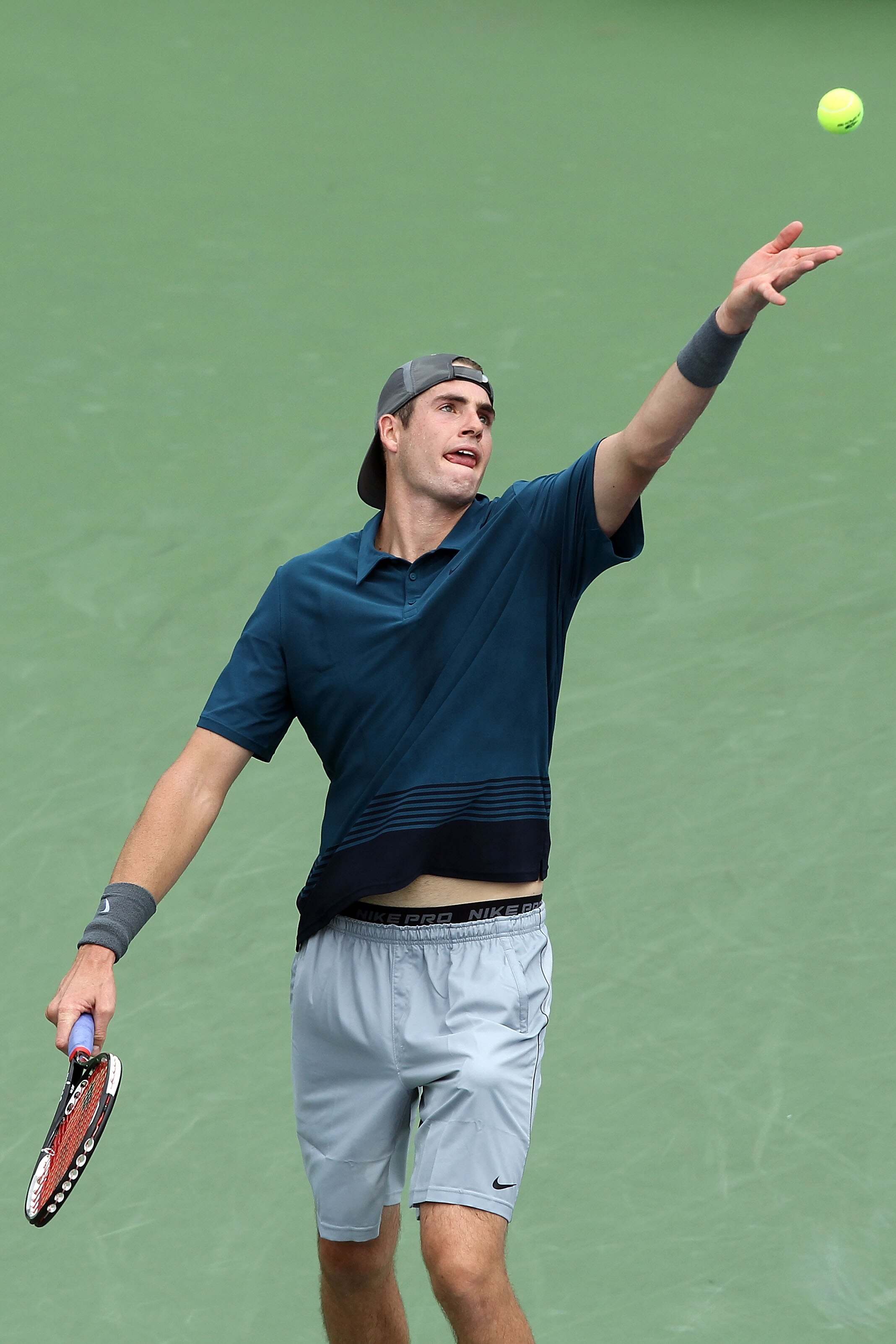 NEW YORK - SEPTEMBER 03:  John Isner of the Untied States serves against Marco Chiudinelli of Switzerland during his men's singles match on day five of the 2010 U.S. Open at the USTA Billie Jean King National Tennis Center on September 3, 2010 in the Flus