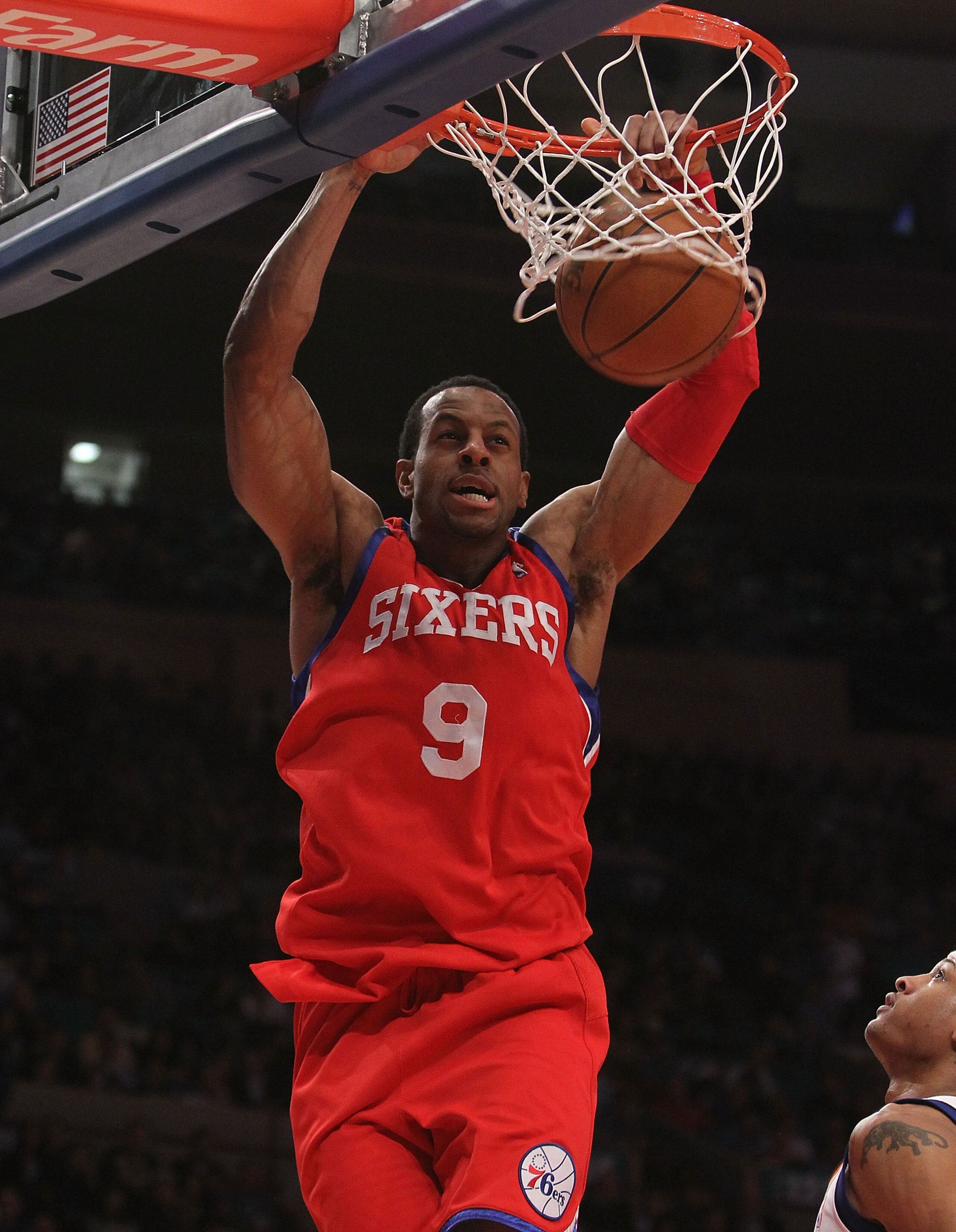 NEW YORK - MARCH 19:  Andre Iguodala #8 of the Philadelphia 76ers dunks the ball against the New York Knicks at Madison Square Garden on March 19, 2010 in New York City. NOTE TO USER: User expressly acknowledges and agrees that, by downloading and or usin