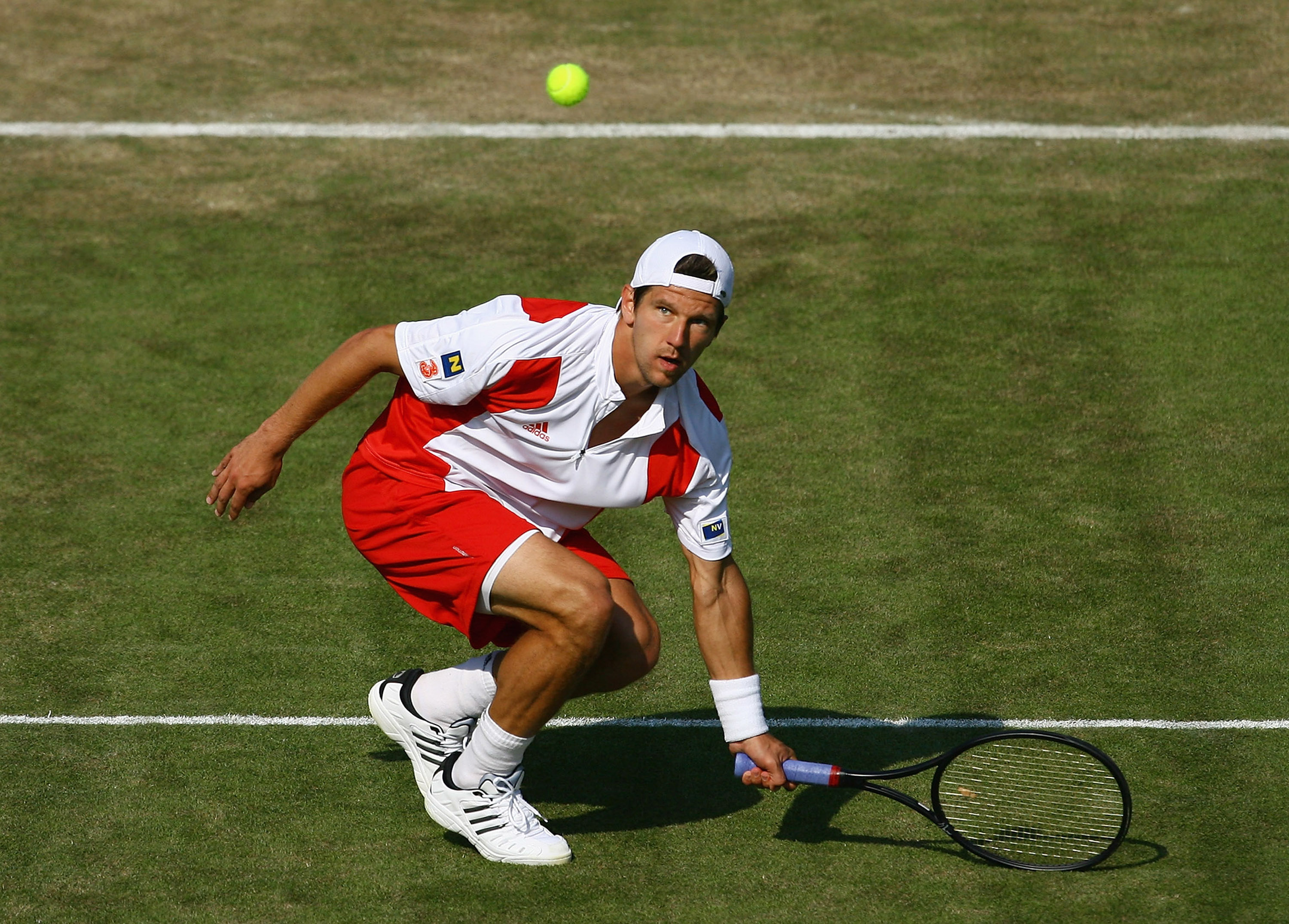LONDON - SEPTEMBER 21:  Jurgen Melzer of Austria in action against Andy Murray of Great Britain during day three of the Davis Cup World Group Playoff tie between Great Britain and Austria at Wimbledon, the AELTC on September 21, 2008 in Wimbledon, England