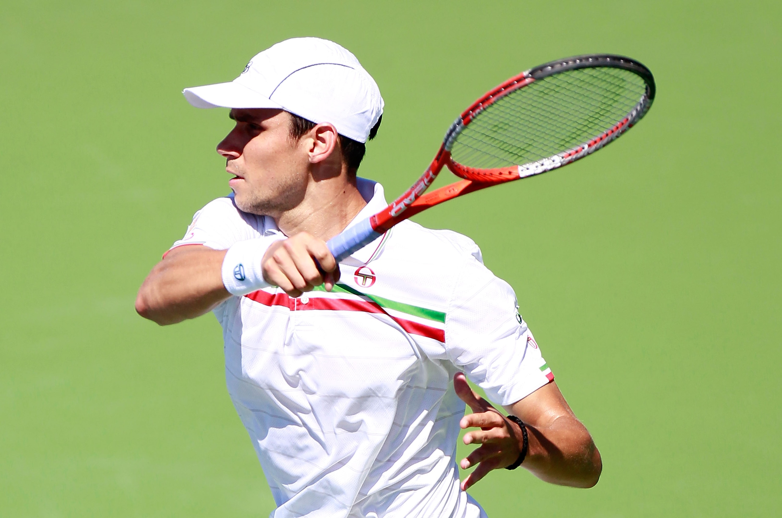CINCINNATI - AUGUST 16:  Victor Hanescu of Romania returns a forehand to Paul-Henri Mathieu of France during Day 1 of the Western & Southern Financial Group Masters at the Lindner Family Tennis Center on August 16, 2010 in Cincinnati, Ohio.  (Photo by Kev