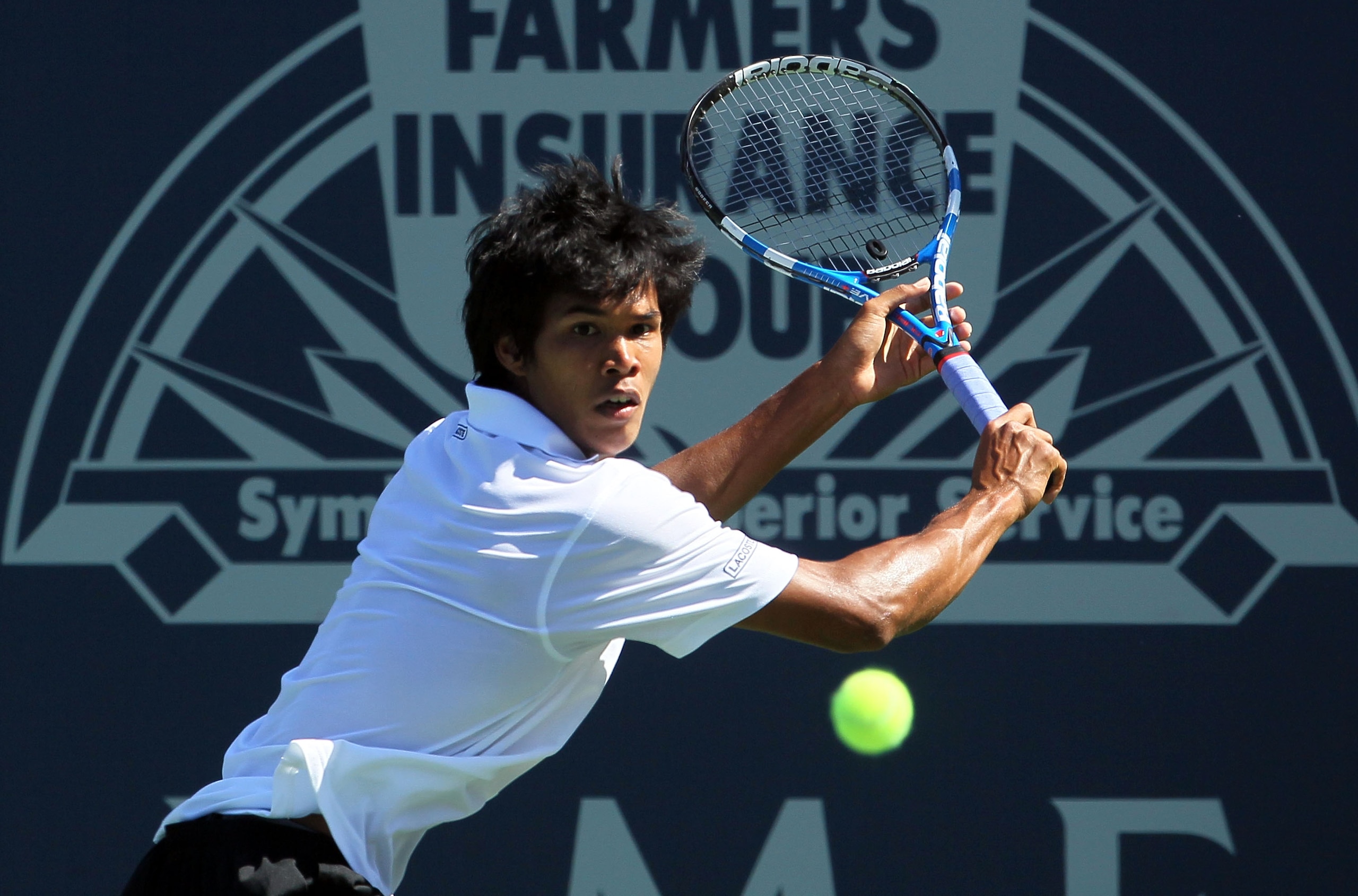 LOS ANGELES, CA - JULY 28:  Somdev Devvarman of India returns a backhand to Janko Tipsarevic of Serbia during the Farmers Classic at the Los Angeles Tennis Center - UCLA on July 28, 2010 in Los Angeles, California.  (Photo by Jeff Gross/Getty Images)