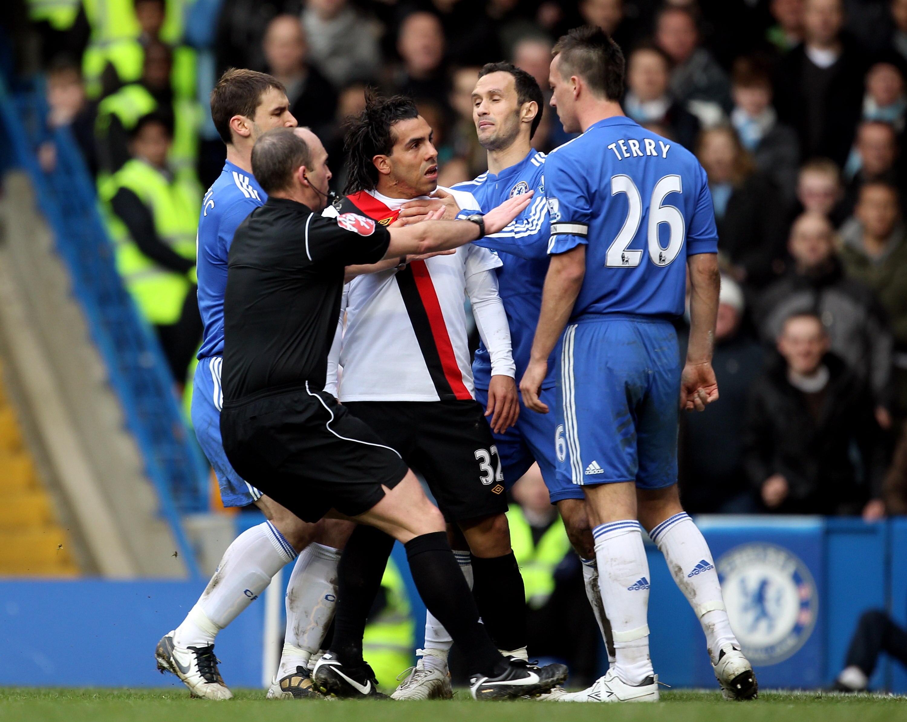 LONDON, ENGLAND - FEBRUARY 27:  John Terry of Chelsea and Carlos Tevez of Manchester City exchange words during the Barclays Premier League match between Chelsea and Manchester City at Stamford Bridge on February 27, 2010 in London, England.  (Photo by Ju