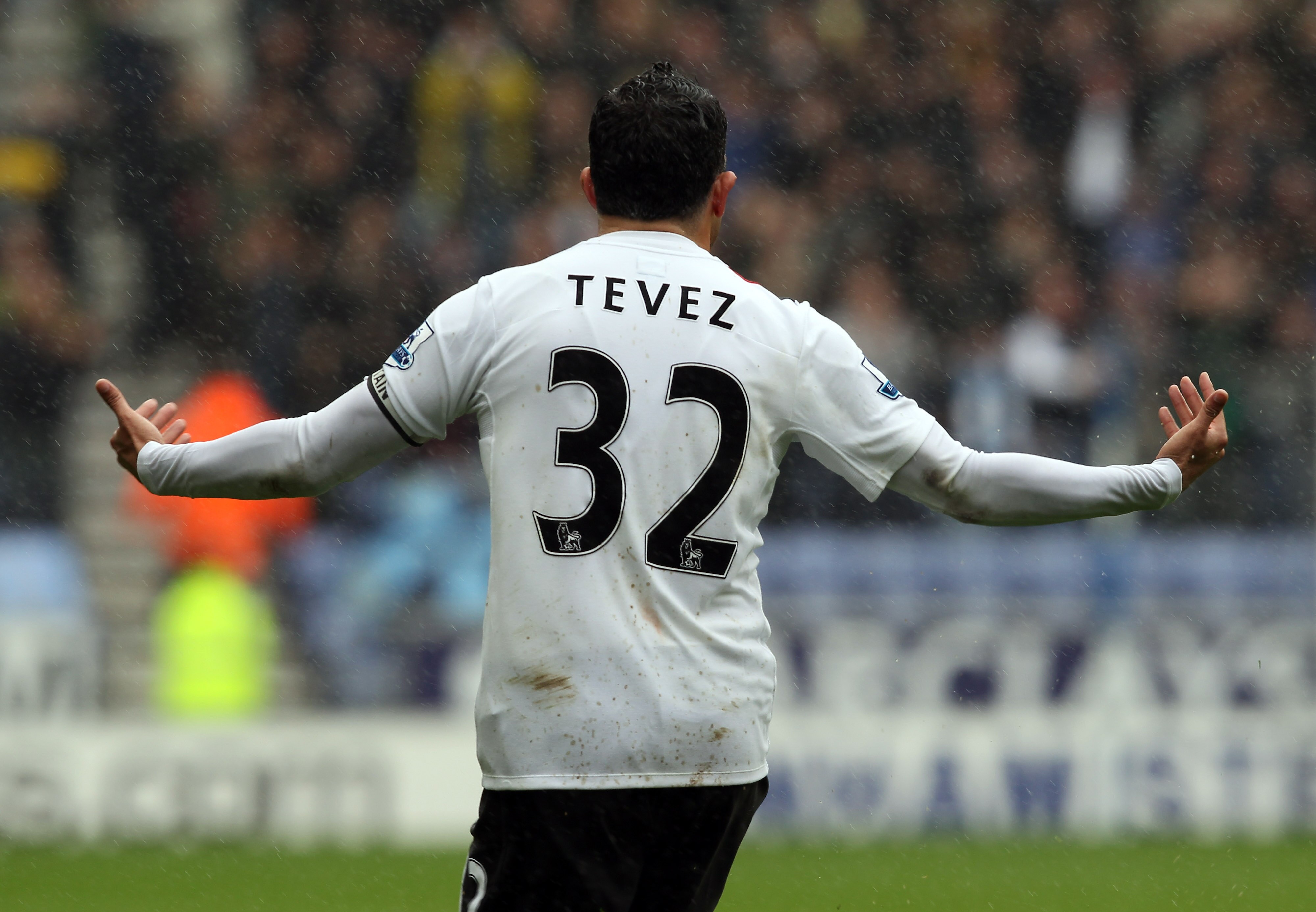 WIGAN, ENGLAND - SEPTEMBER 19:  Carlos Tevez of Manchester Citycelebrates after he  scores the opening goal during the Barclays Premiership match between Wigan Athletic and Manchester City at the DW Stadium on September 19, 2010 in Wigan, England.  (Photo