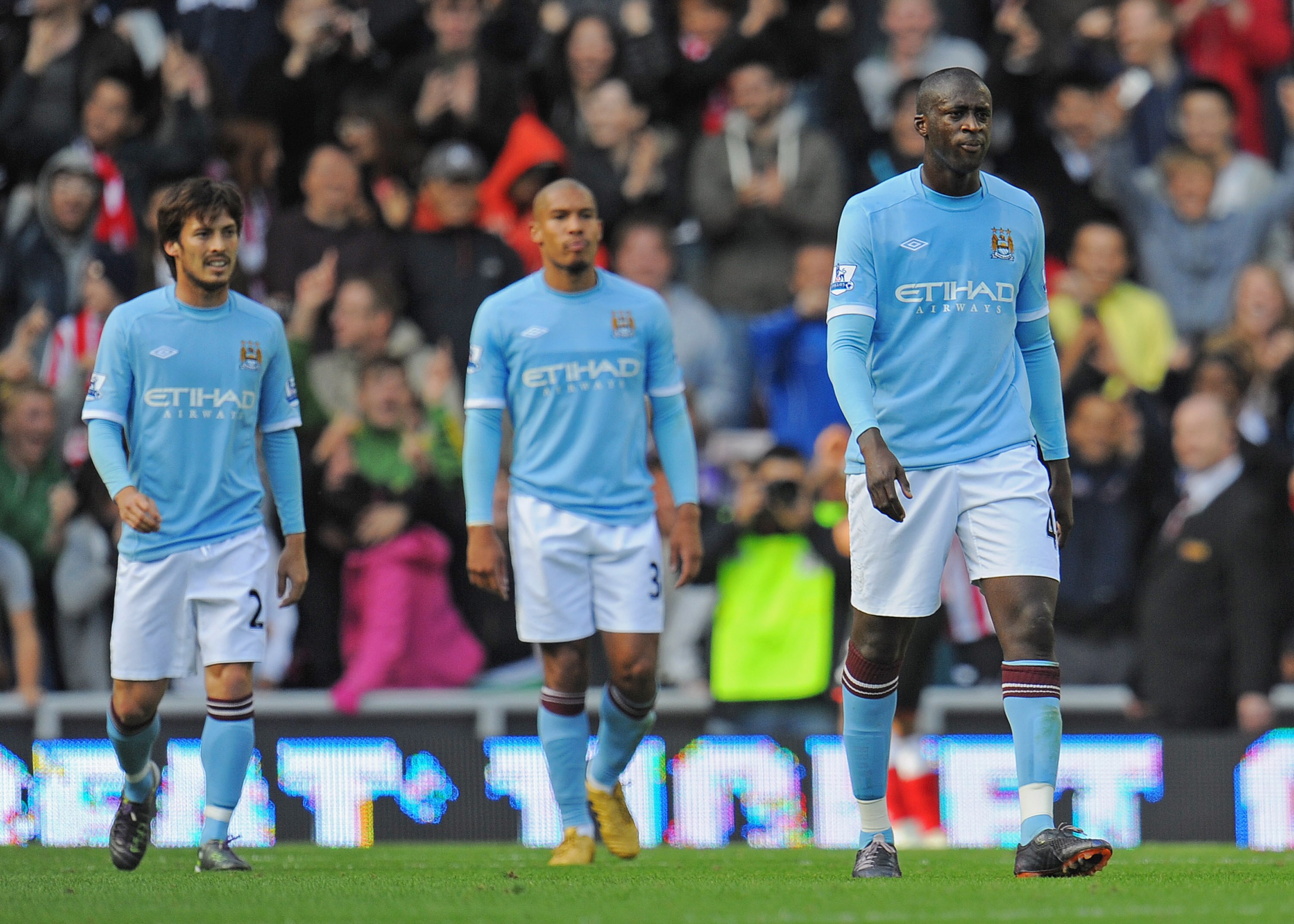 SUNDERLAND, ENGLAND - AUGUST 29: Yaya Toure, Nigel De Jong and David Silva look dejected after Sunderland's goal during the Barclays Premier League match between Sunderland and Manchester City at the Stadium of Light on August 29, 2010 in Sunderland, Engl