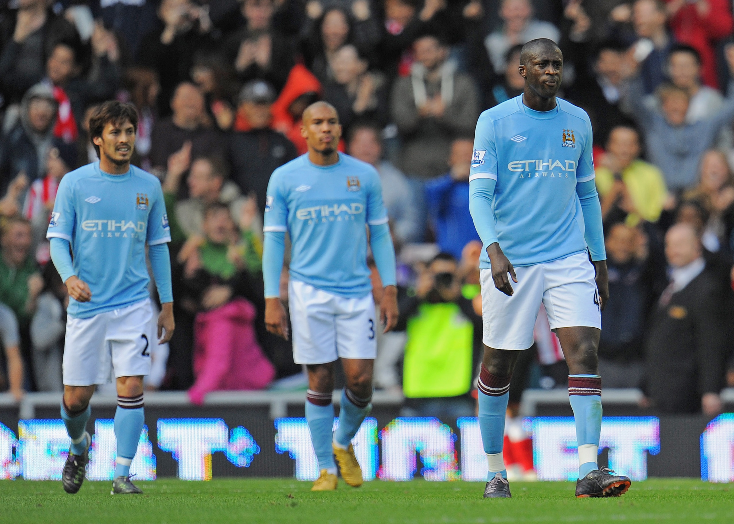 SUNDERLAND, ENGLAND - AUGUST 29: Yaya Toure, Nigel De Jong and David Silva look dejected after Sunderland's goal during the Barclays Premier League match between Sunderland and Manchester City at the Stadium of Light on August 29, 2010 in Sunderland, Engl
