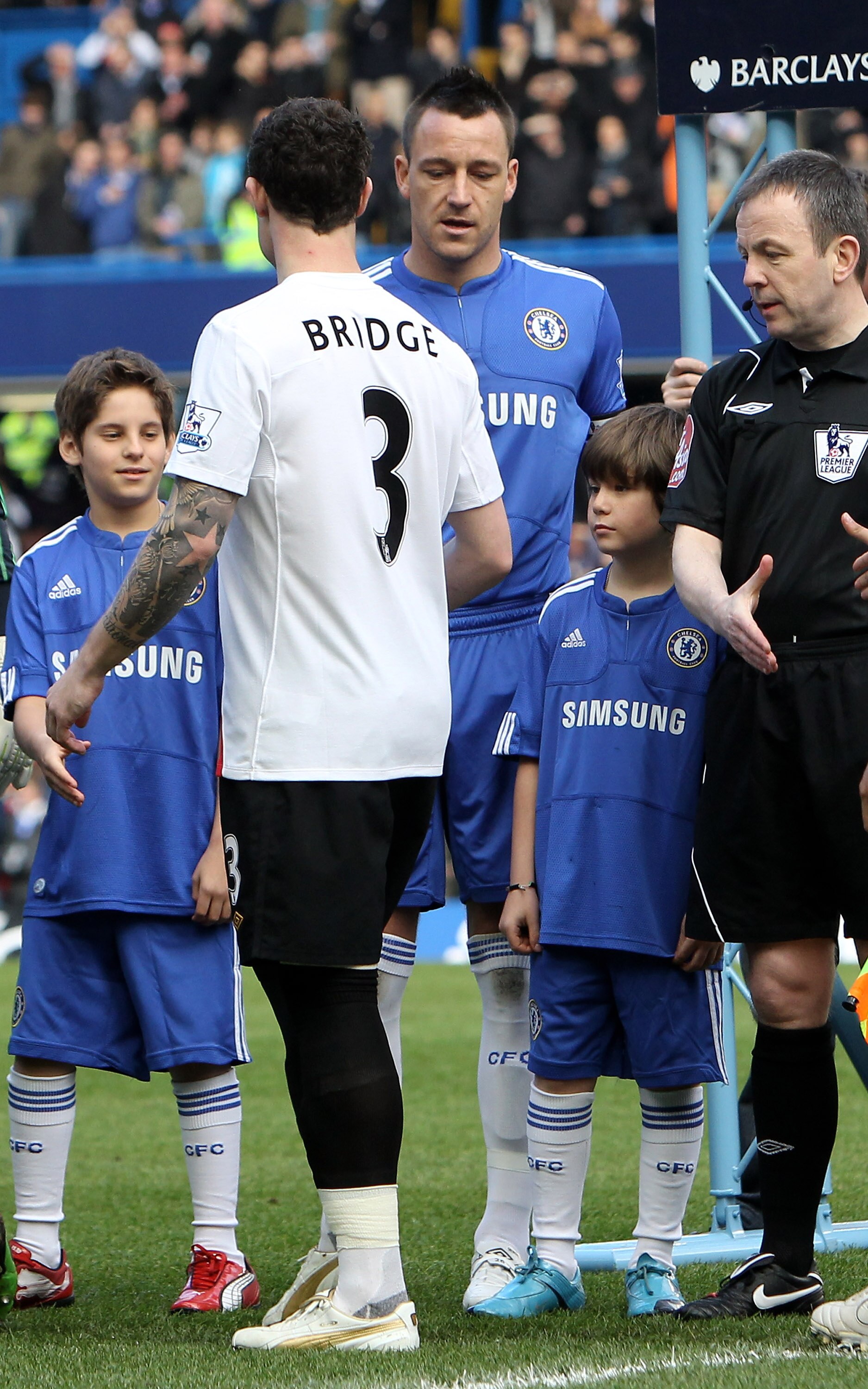 LONDON, ENGLAND - FEBRUARY 27:  John Terry of Chelsea and Wayne Bridge of Manchester City walk past each other prior to the Barclays Premier League match between Chelsea and Manchester City at Stamford Bridge on February 27, 2010 in London, England.  (Pho