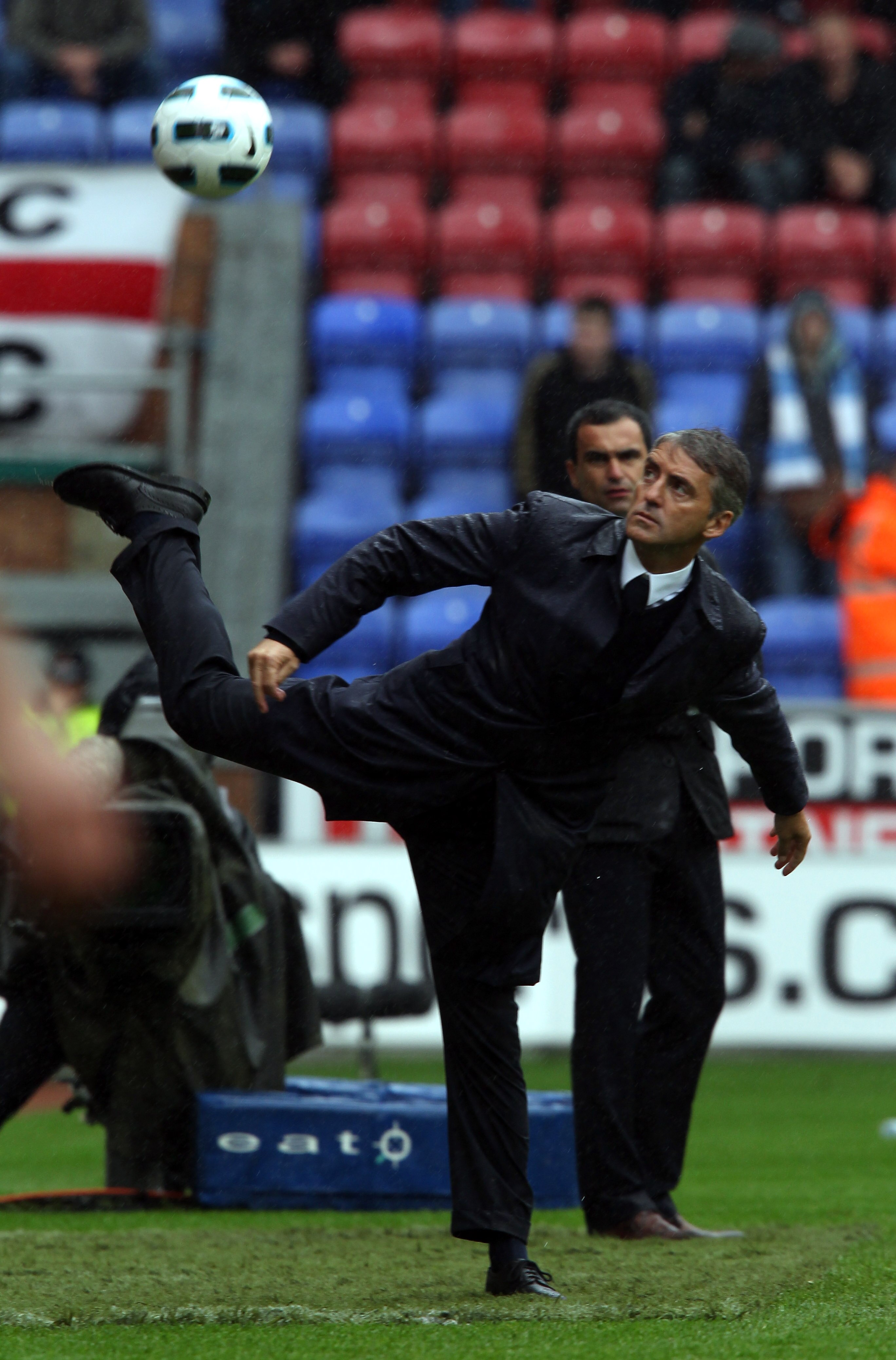 WIGAN, ENGLAND - SEPTEMBER 19:  Roberto Mancini, the Manchester City manager during the Barclays Premiership match between Wigan Athletic and Manchester City at the DW Stadium on September 19, 2010 in Wigan, England.  (Photo by Ross Kinnaird/Getty Images)