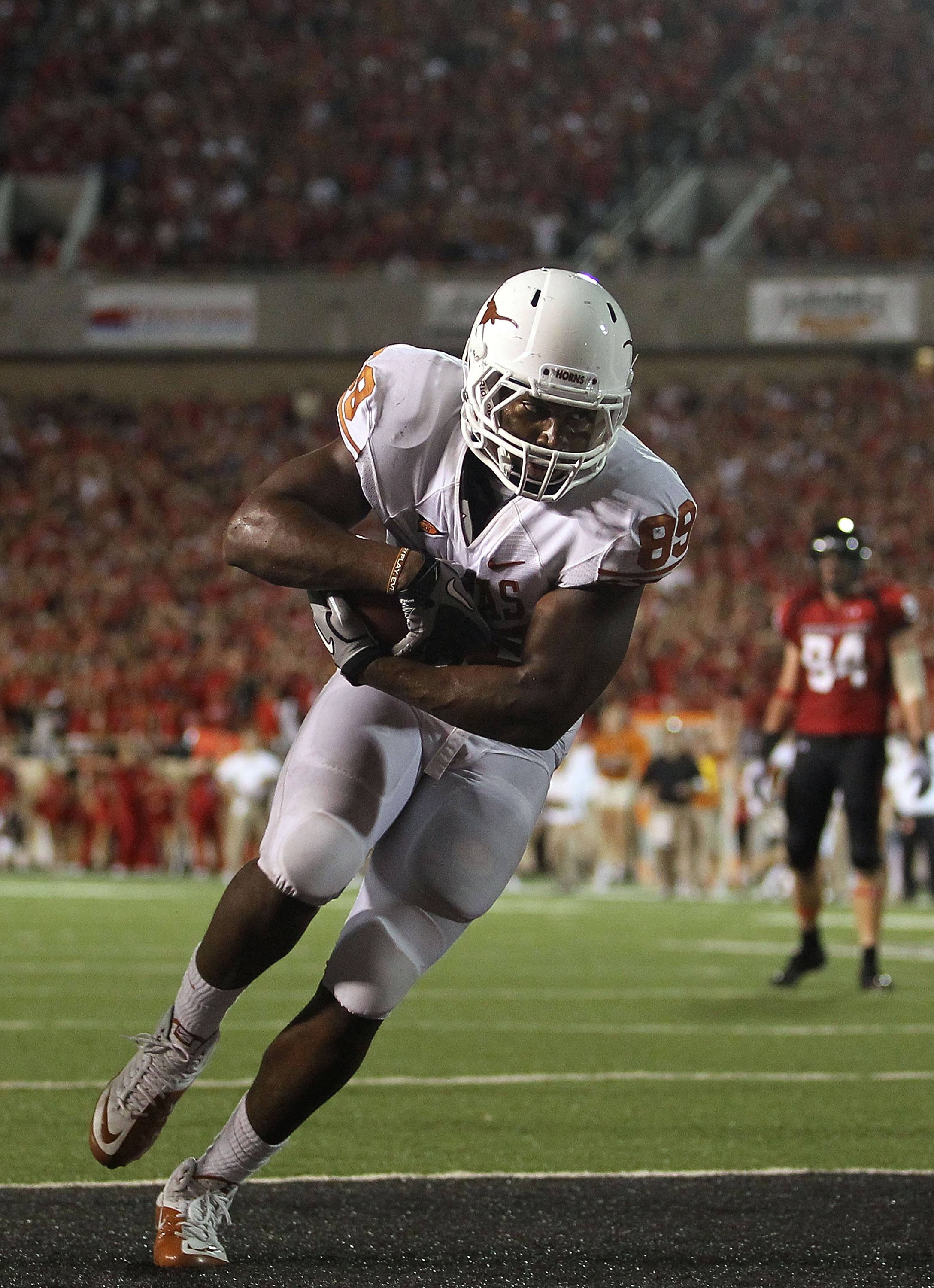 LUBBOCK, TX - SEPTEMBER 18:  Tight end Barrett Matthews #89 of the Texas Longhorns makes a touchdown passs reception against the Texas Tech Red Raiders in the fourth quarter at Jones AT&T Stadium on September 18, 2010 in Lubbock, Texas.  (Photo by Ronald 