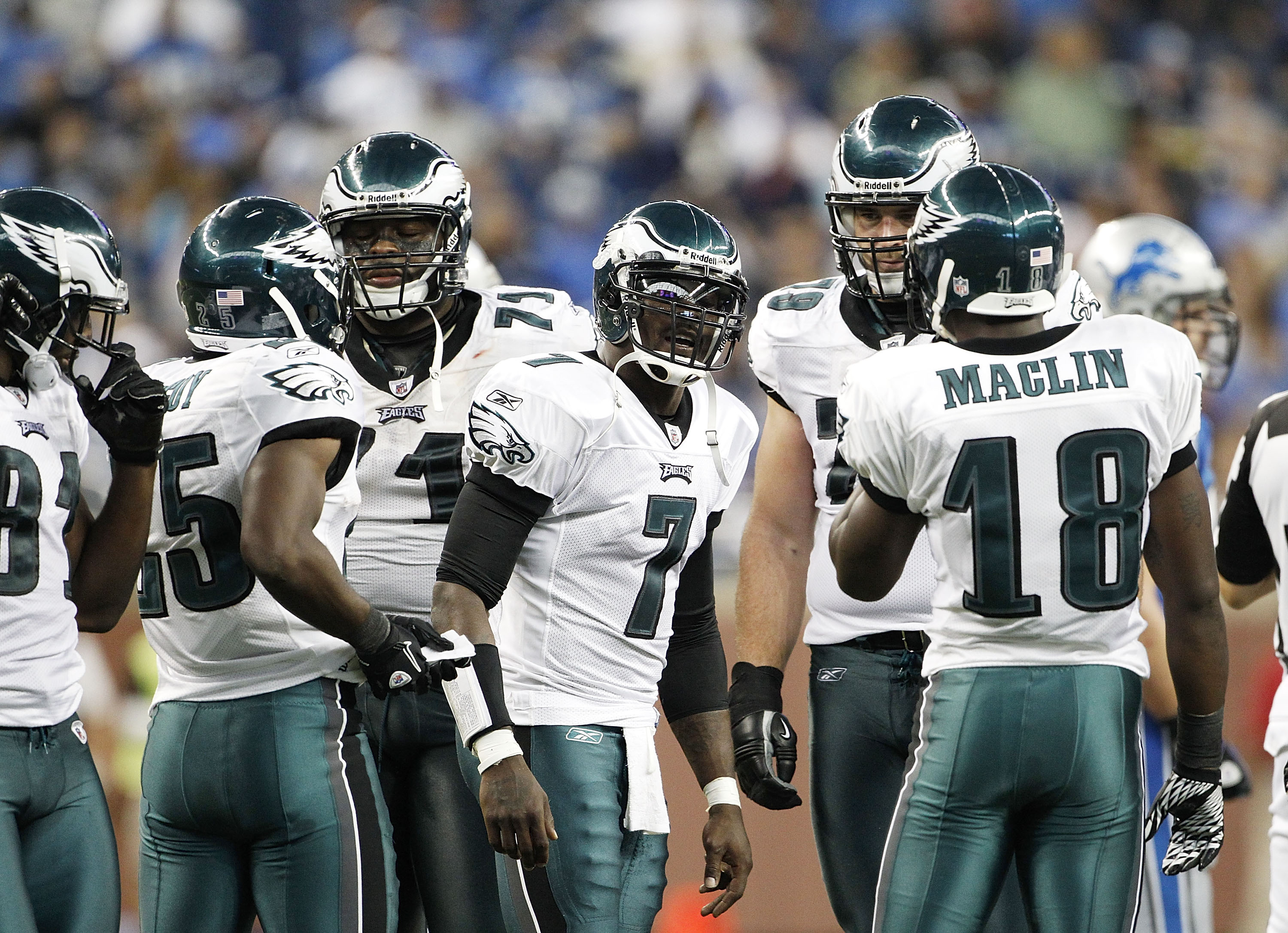 DETROIT - SEPTEMBER 19:  Michael Vick #7 of the Philadelphia Eagles calls the play in the huddle during the third quarter of the game against the Detroit Lions at Ford Field on September 19, 2010 in Detroit, Michigan. The Eagles defeated the Lions 35-32.