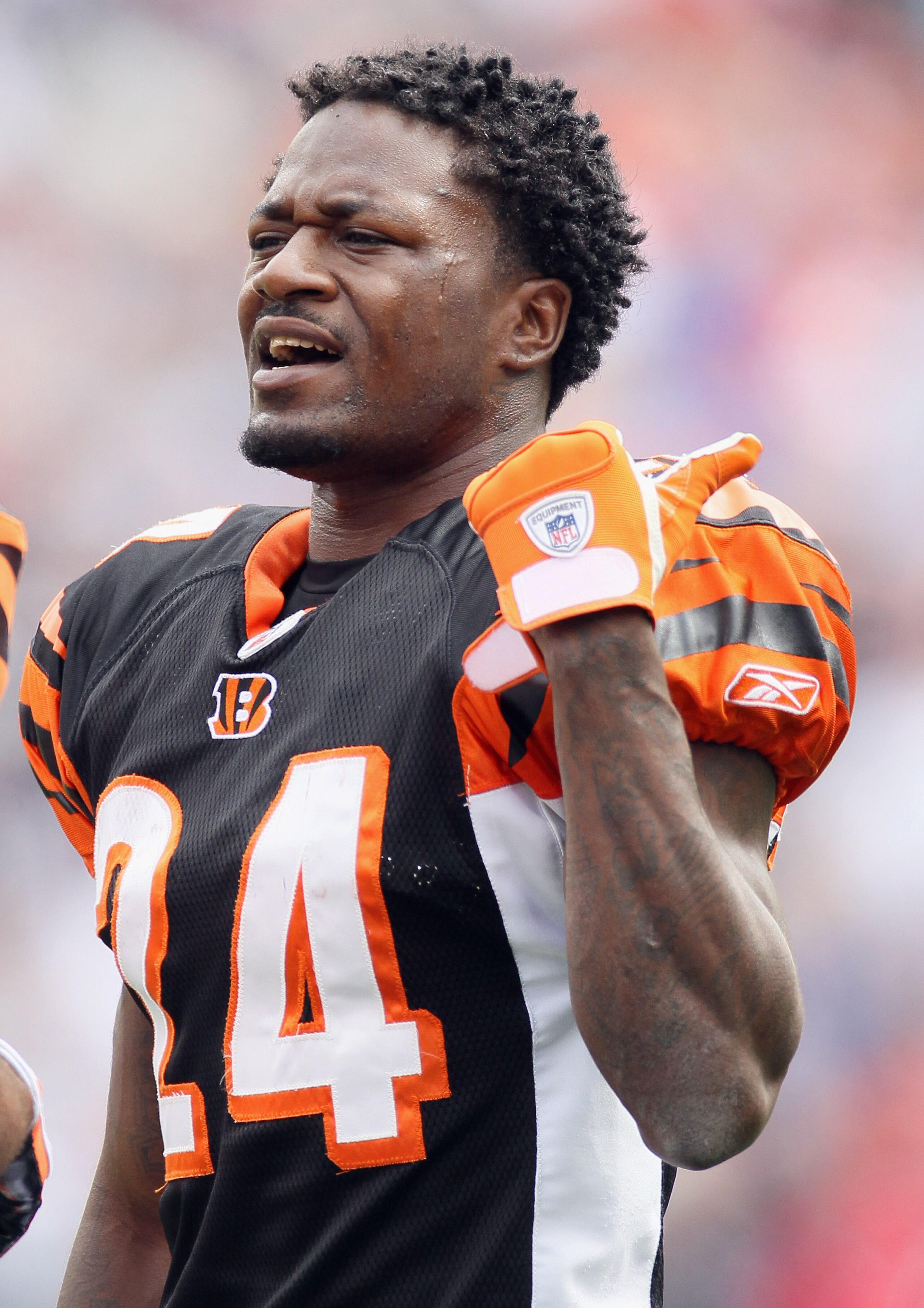 FOXBORO, MA - SEPTEMBER 12:  Adam Jones #24 of the Cincinnati Bengals talks from the sideline in the second half against the New England Patriots during the NFL season opener on September 12, 2010 at Gillette Stadium in Foxboro, Massachusetts.  (Photo by